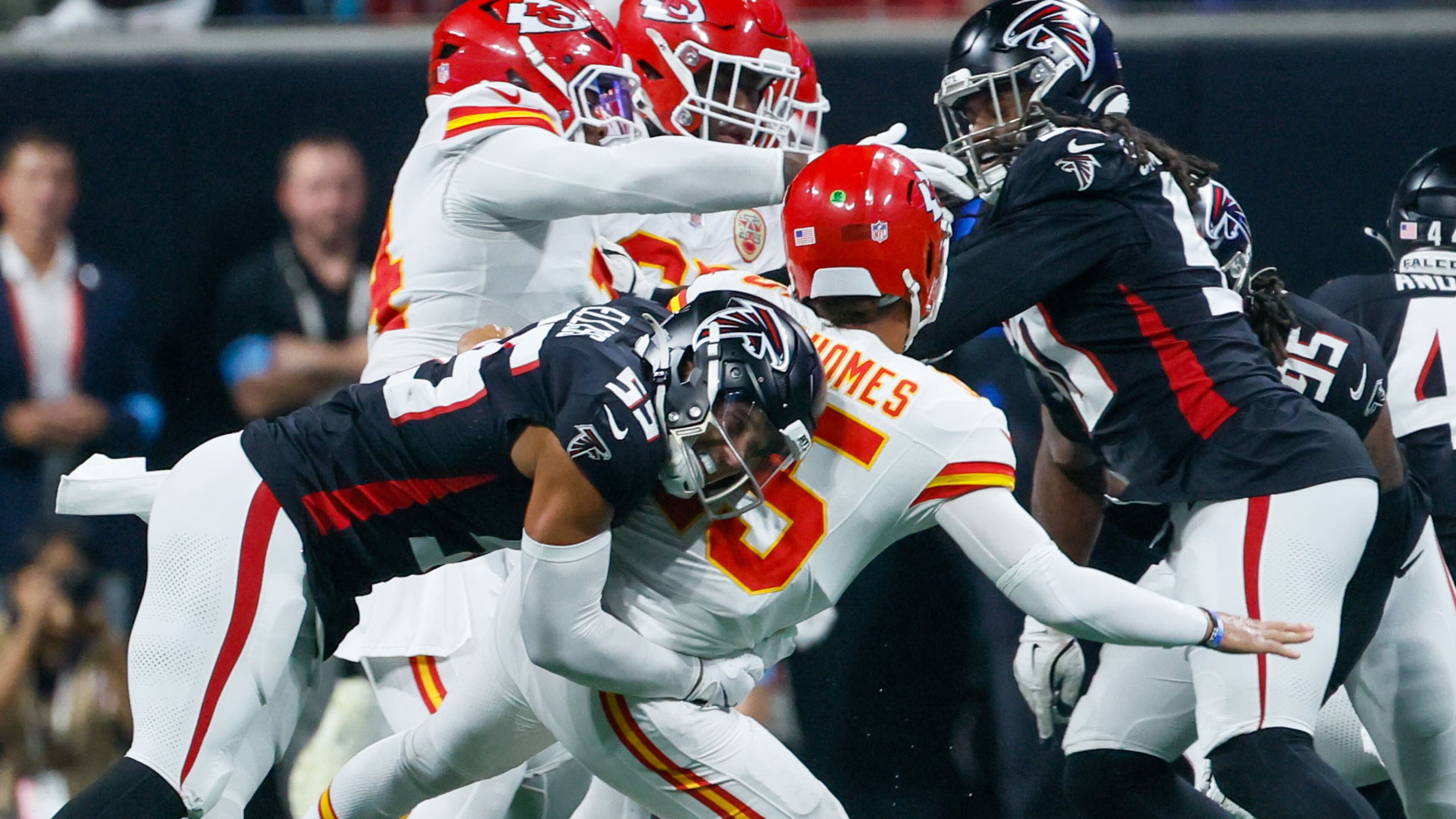 Atlanta Falcons linebacker Kaden Elliss (55) sacks Kansas City Chiefs quarterback Patrick Mahomes (15) as he throws for an interception during the first half on Sunday, Sept. 22, 2024, at Mercedes-Benz Stadium in Atlanta.
(Miguel Martinez/ AJC)