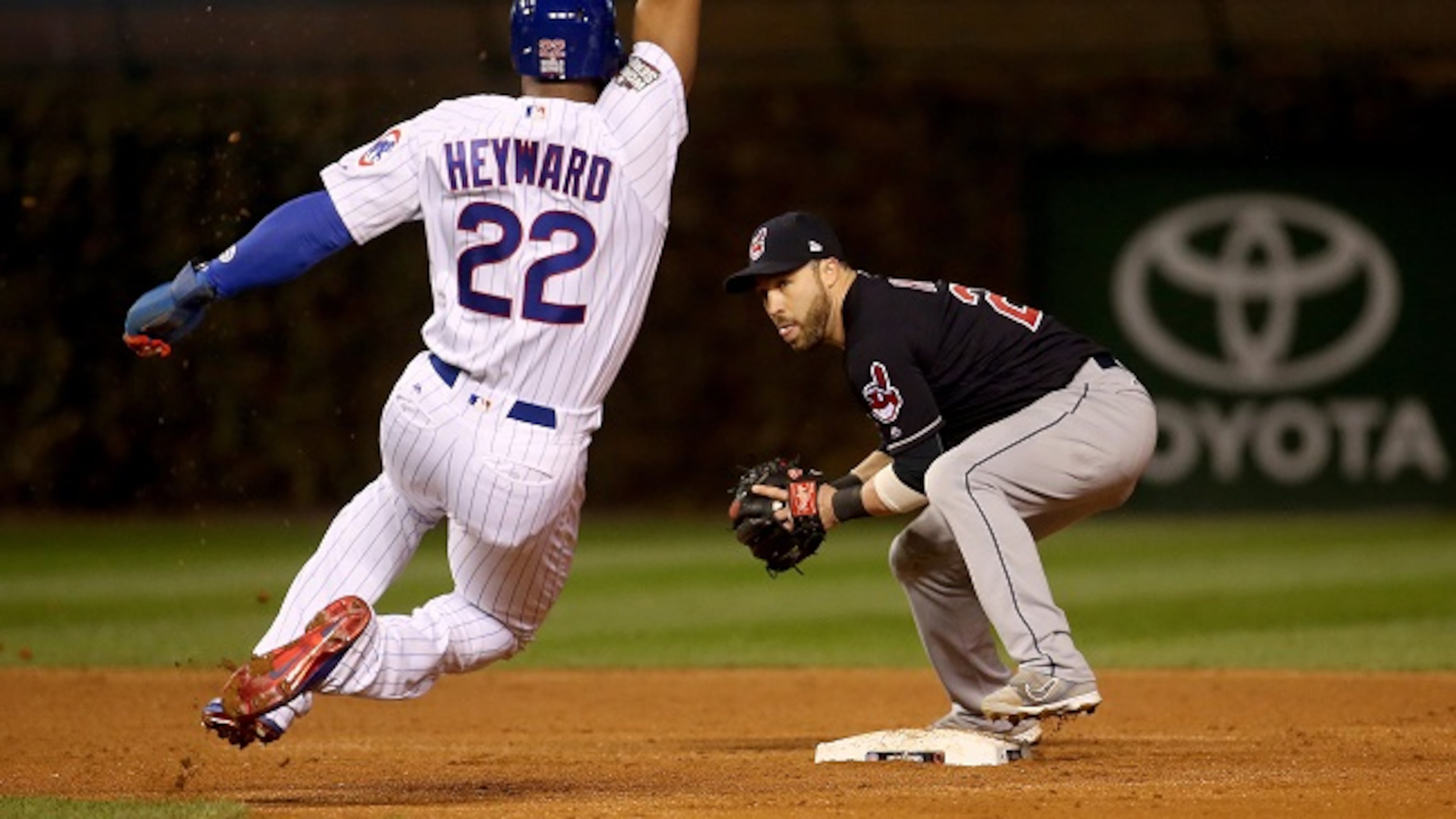 Chicago Cubs right fielder Jason Heyward (22) is out as he slides into second base against Cleveland Indians second baseman Jason Kipnis (22) in the second inning Saturday, Oct. 29, 2016 in Game 4 of the World Series at Wrigley Field in Chicago. (Brian Cassella/Chicago Tribune/TNS)