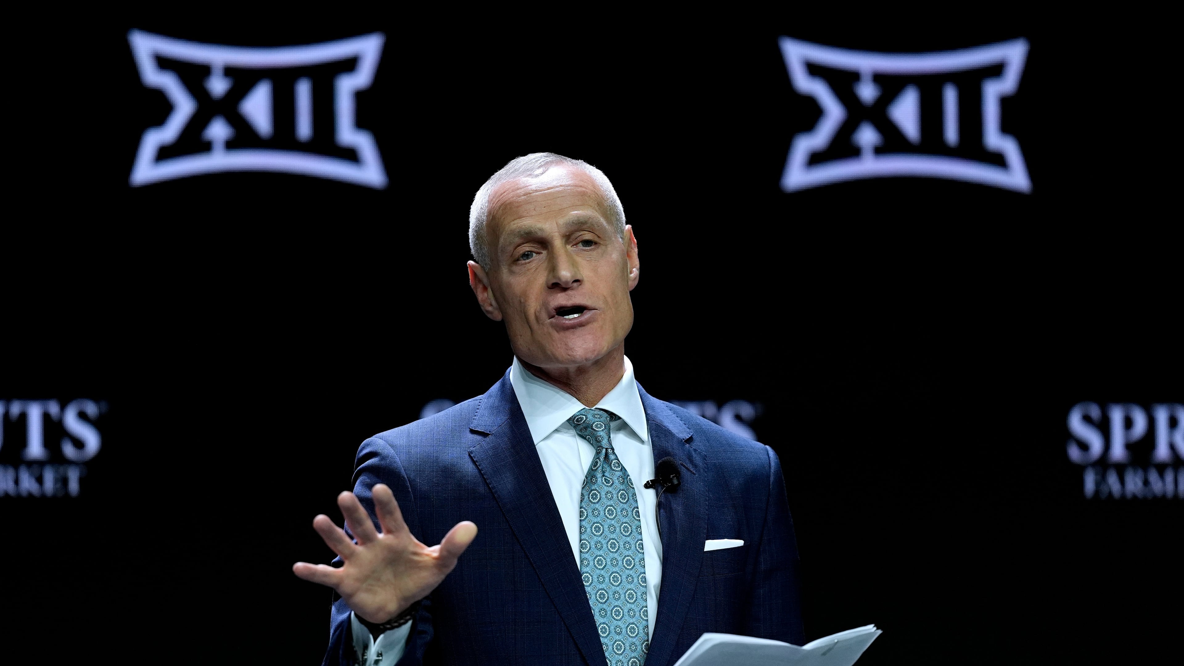 FILE - Big 12 Commissioner Brett Yormark addresses the media during the NCAA college Big 12 women's basketball media day, Oct. 22, 2024, in Kansas City, Mo. (AP Photo/Charlie Riedel, File)