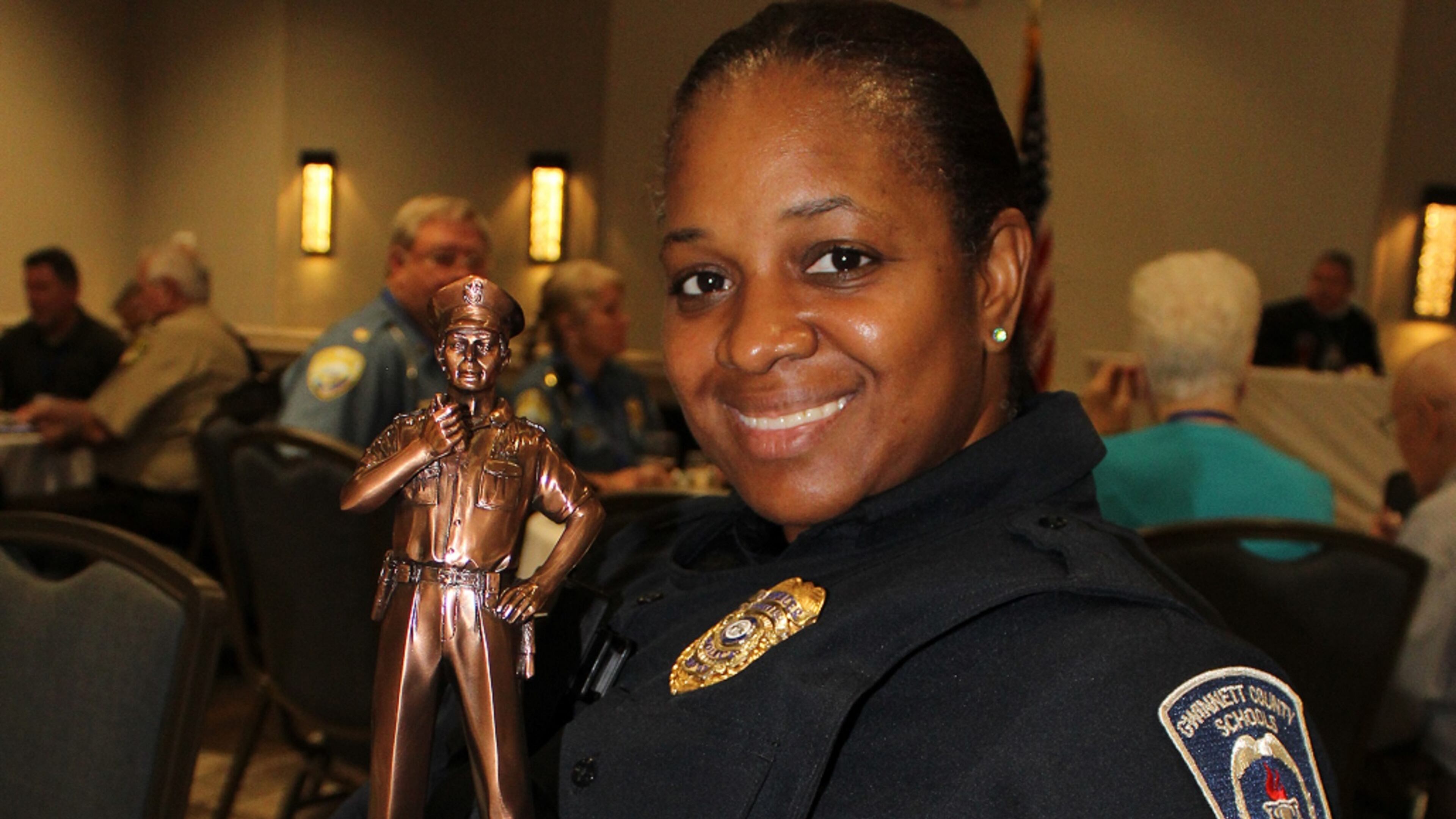 Gwinnett School Resource Officer Nicolette McLeod-Pinnock was recently honored with the Peace Officers Association of Georgia’s Officer of the Year Award for Valor when she apprehended a student who had stabbed a teacher. COURTESY OF GWINNETT COUNTY PUBLIC SCHOOLS
