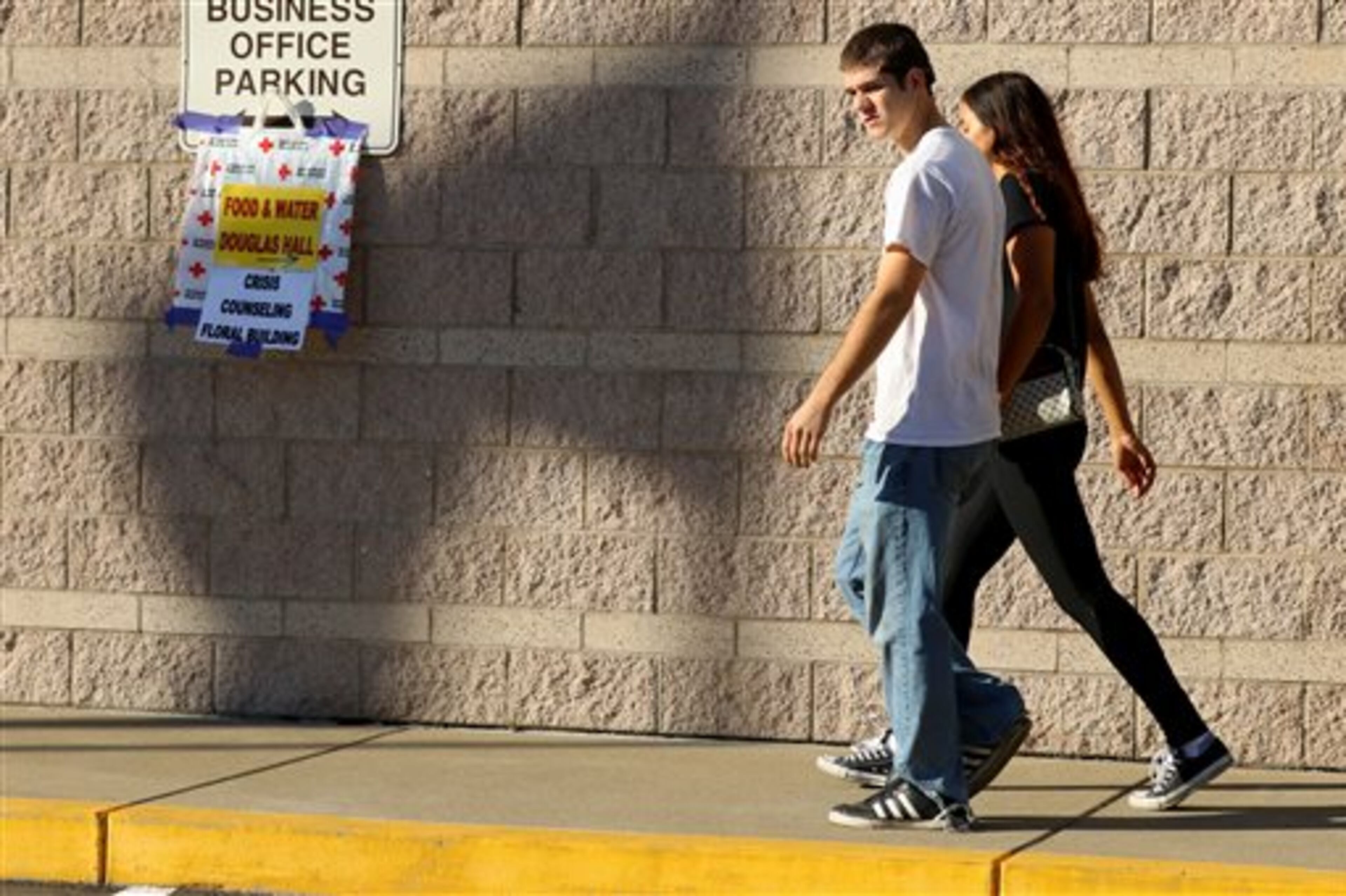 Click on this link for updates on the Oregon school shooting. People leave the county fairgrounds in Roseburg, Ore., Thursday, Oct. 1, 2015, following a deadly shooting at nearby Umpqua Community College. Students and faculty were bused to the fairgrounds where counselors were available and some parents waited for their children. (AP Photo/Ryan Kang)