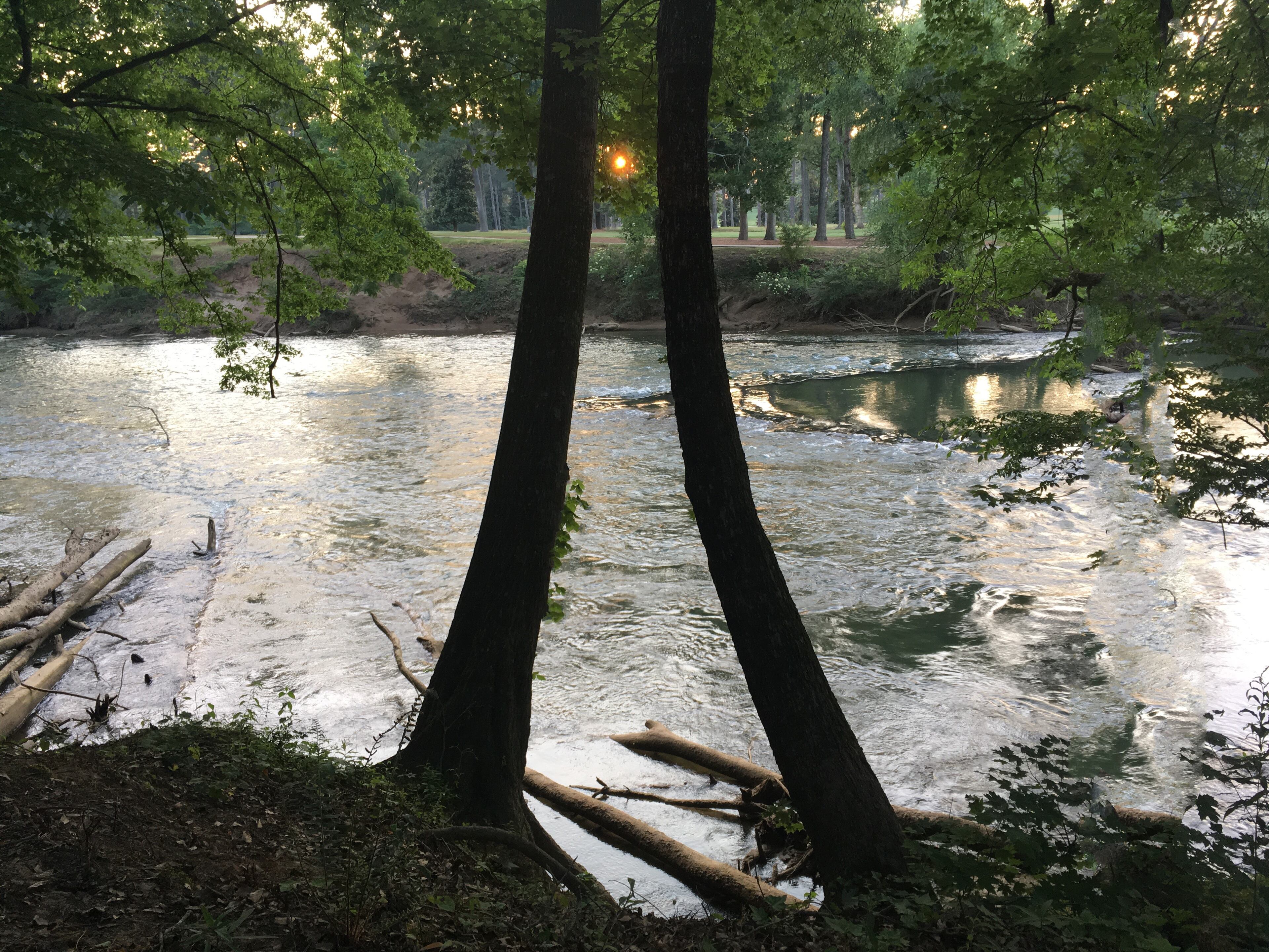 "This image shows not just the sun setting but a clear view of a fish weir built by the Cherokee and Creek Indians many years ago. The calm Chattahoochee water, as seen in the "V", is where they rounded up their catch. The Atlanta Athletic Club is in the background. Hallowed ground, for sure!!" wrote Gary McBride of Berkeley Lake.