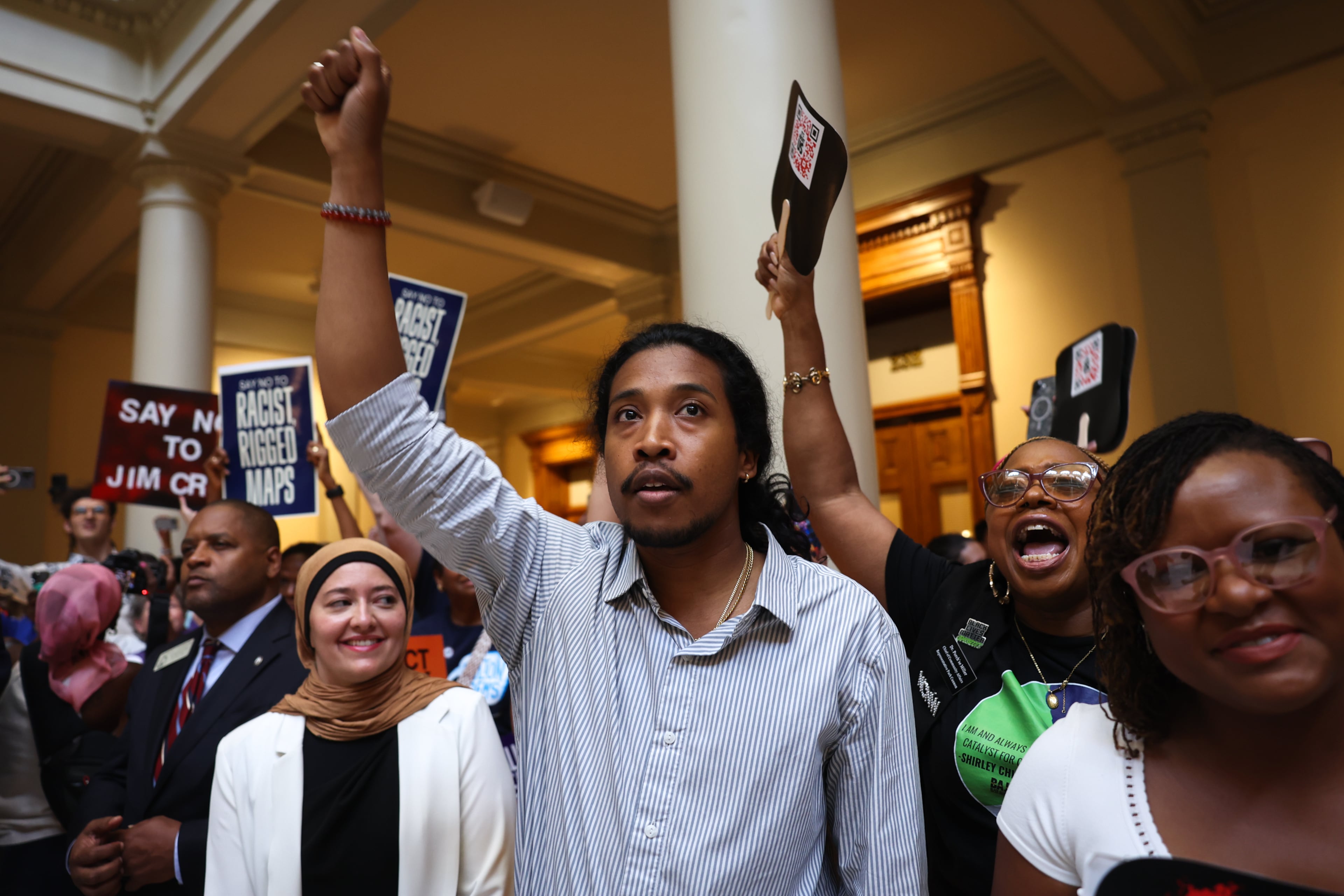Activists opposed to redistricting, including Tennessee Democratic State Rep. Justin Jones, react when State House Speaker Jon Burns, R-Newington, announces that Republicans won’t redraw the state’s political maps during the special session starting in Atlanta on June 17, 2026. (Arvin Temkar/AJC)