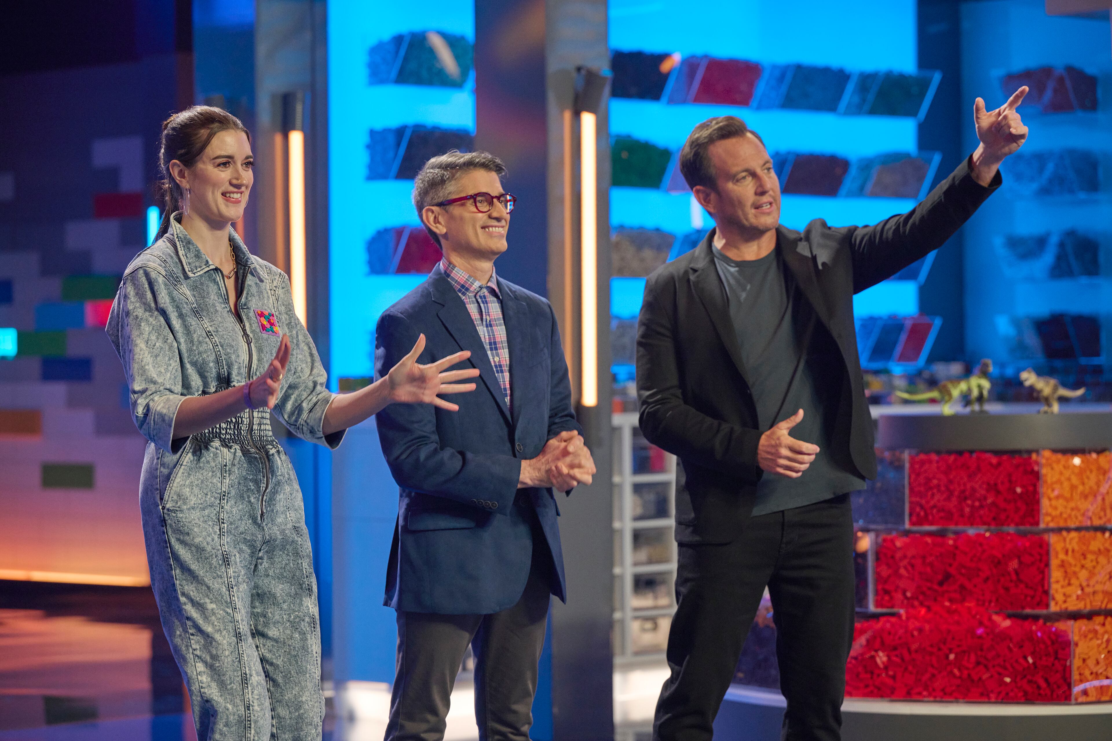LEGO MASTERS: L-R: Judges Amy Corbett and Jamie Berard with Host Will Arnett in Season Three of LEGO MASTERS premiering Wednesday, Sept. 21 (9:00-10:00 PM ET/PT) on FOX.. ©2022 FOX MEDIA LLC. CR: Tom Griscom/FOX