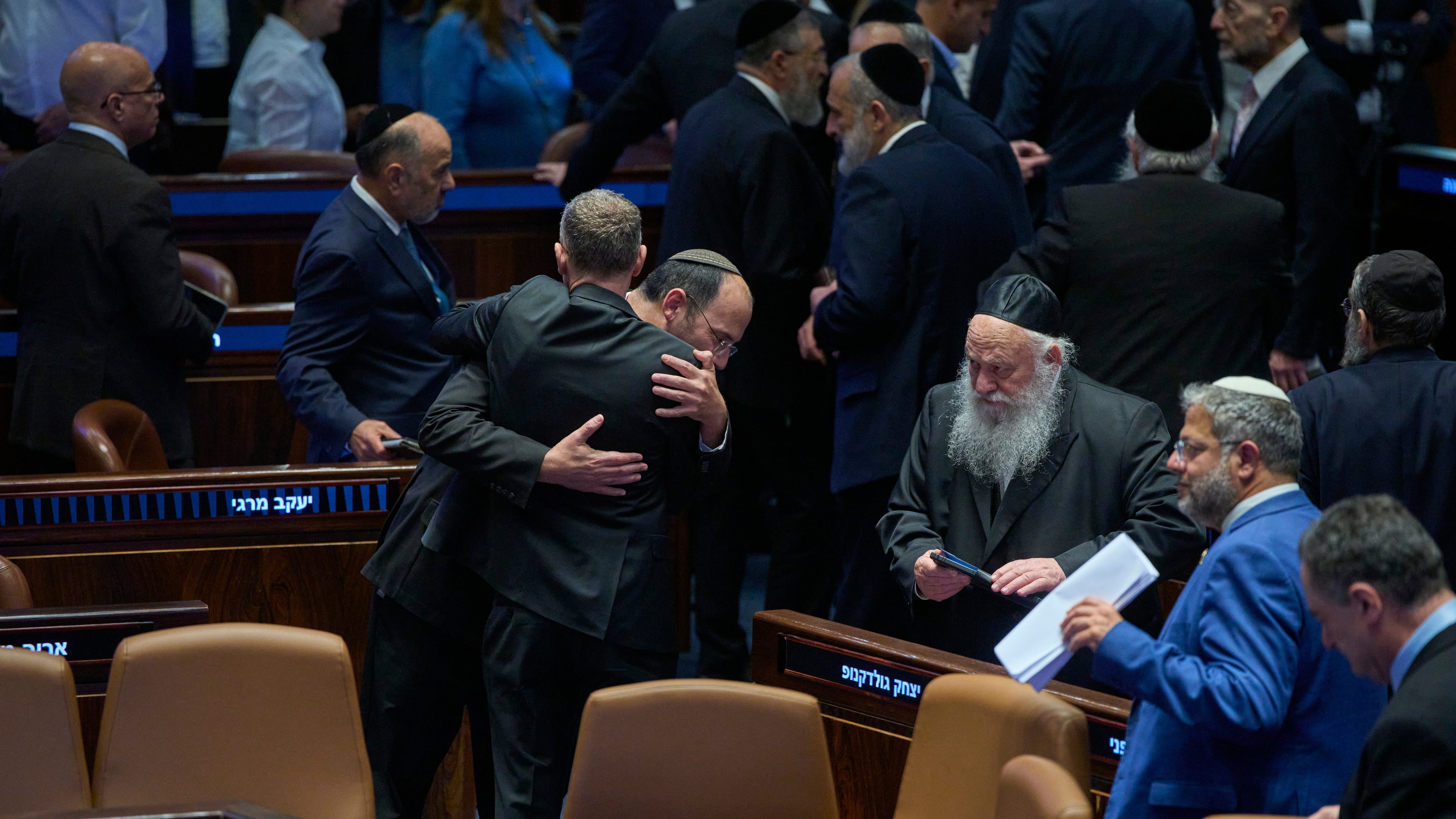 Israeli lawmakers attend a parliamentary session in Jerusalem for a vote on a bill that would change the authority and responsibilities of the attorney general Wednesday, July 15, 2026, in Jerusalem. (AP Photo/Ohad Zwigenberg)