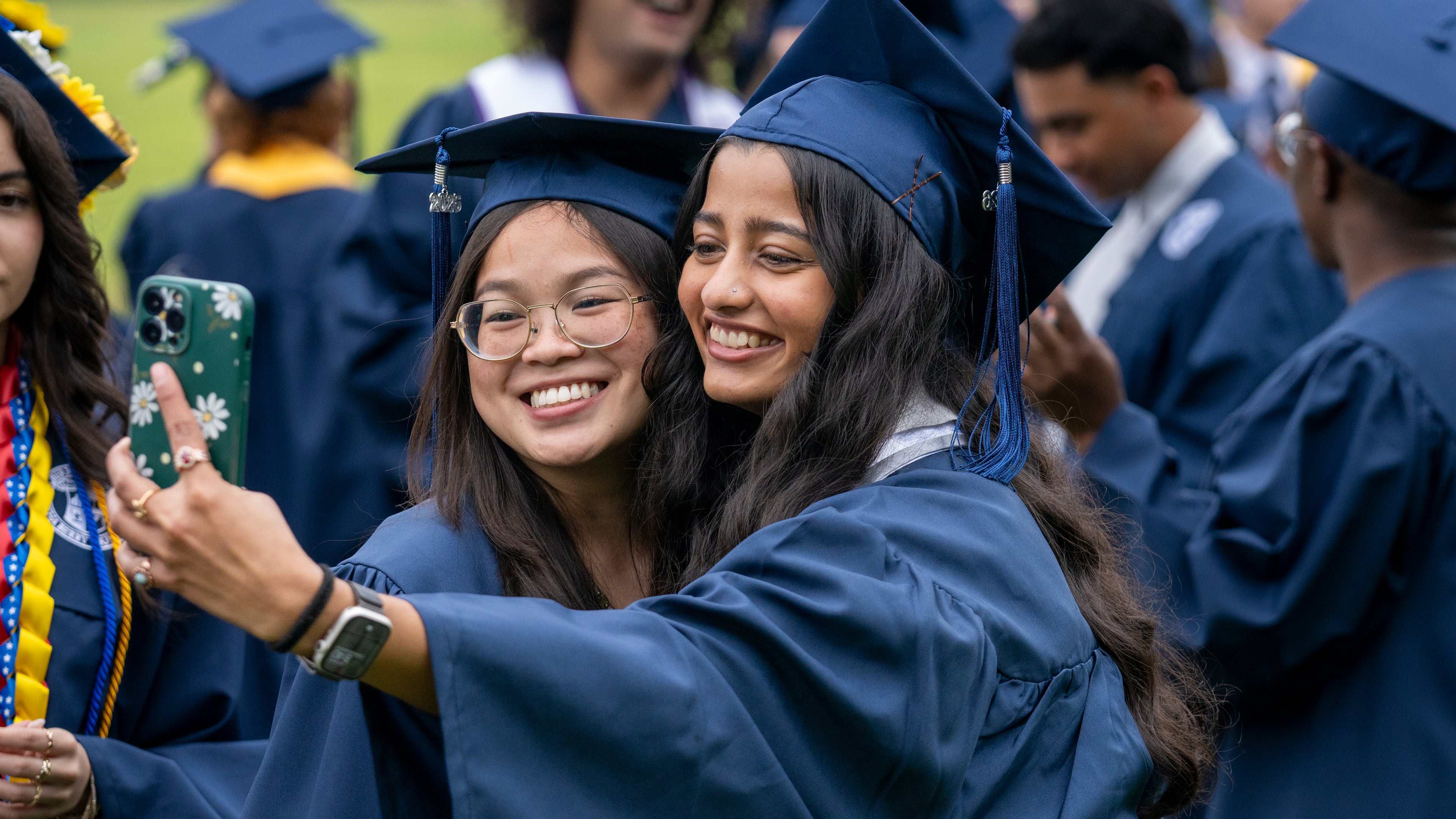 Sophia Newell and Harvy Patel take a selfie before the commencement ceremony at Berry College on Saturday May 9, 2026. (Daniel Whiting/Berry College)