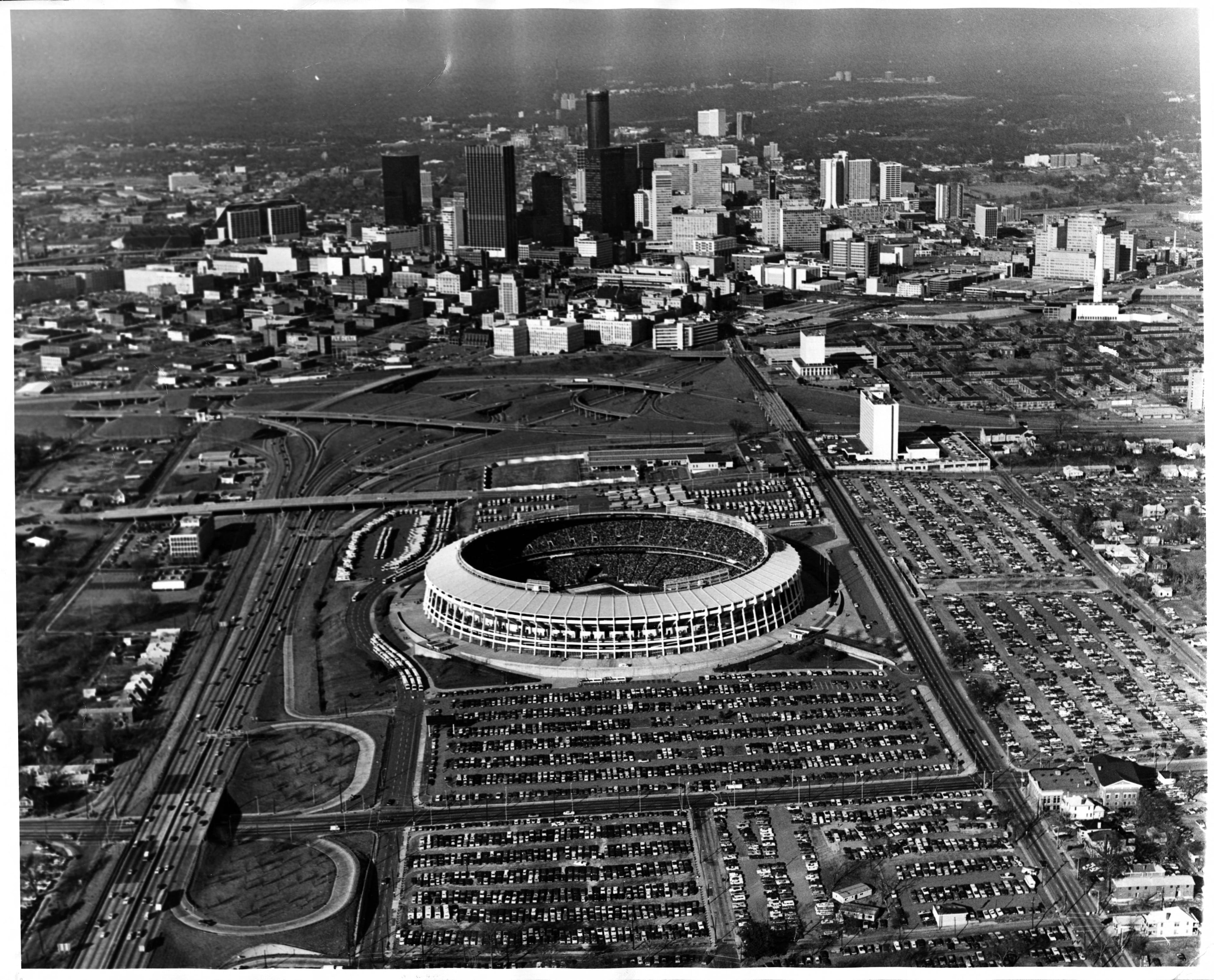 Aerial view of Atlanta, Georgia, and the Atlanta-Fulton County Stadium (middle ground), circa 1976.
