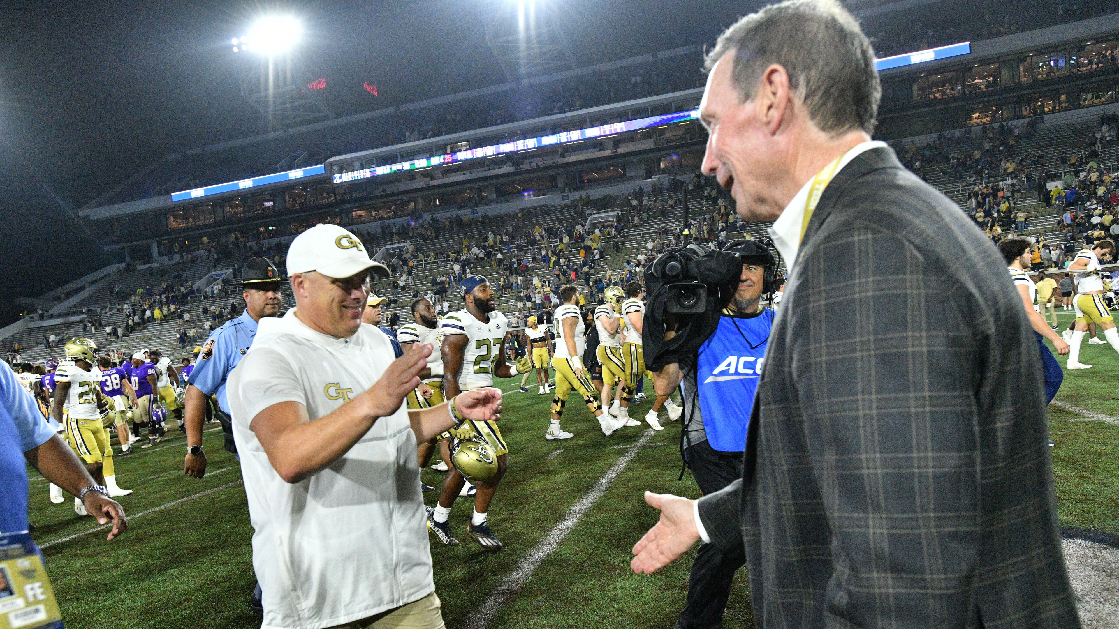 September 9, 2022 Atlanta - Georgia Tech's head coach Geoff Collins is greeted by Director of Athletics Todd Stansbury after Georgia Tech beat Western Carolina in an NCAA college football game at Georgia Tech's Bobby Dodd Stadium in Atlanta on Saturday, September 10, 2022. Georgia Tech won 35-17 over Western Carolina. (Hyosub Shin / Hyosub.Shin@ajc.com)