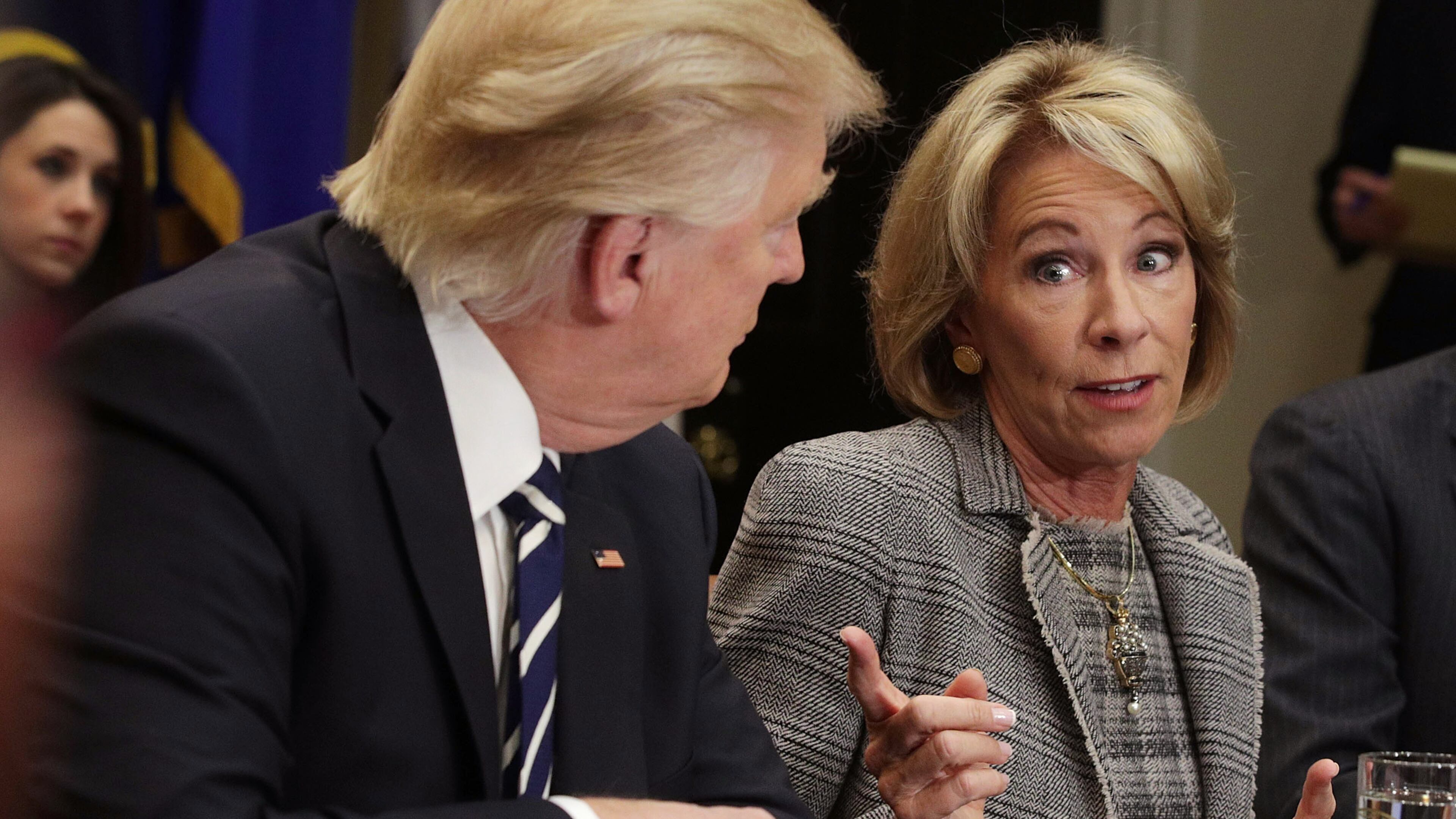 U.S. Secretary of Education Betsy DeVos speaks as President Donald Trump listens during a listening session at the White House last week. (Photo by Alex Wong/Getty Images)