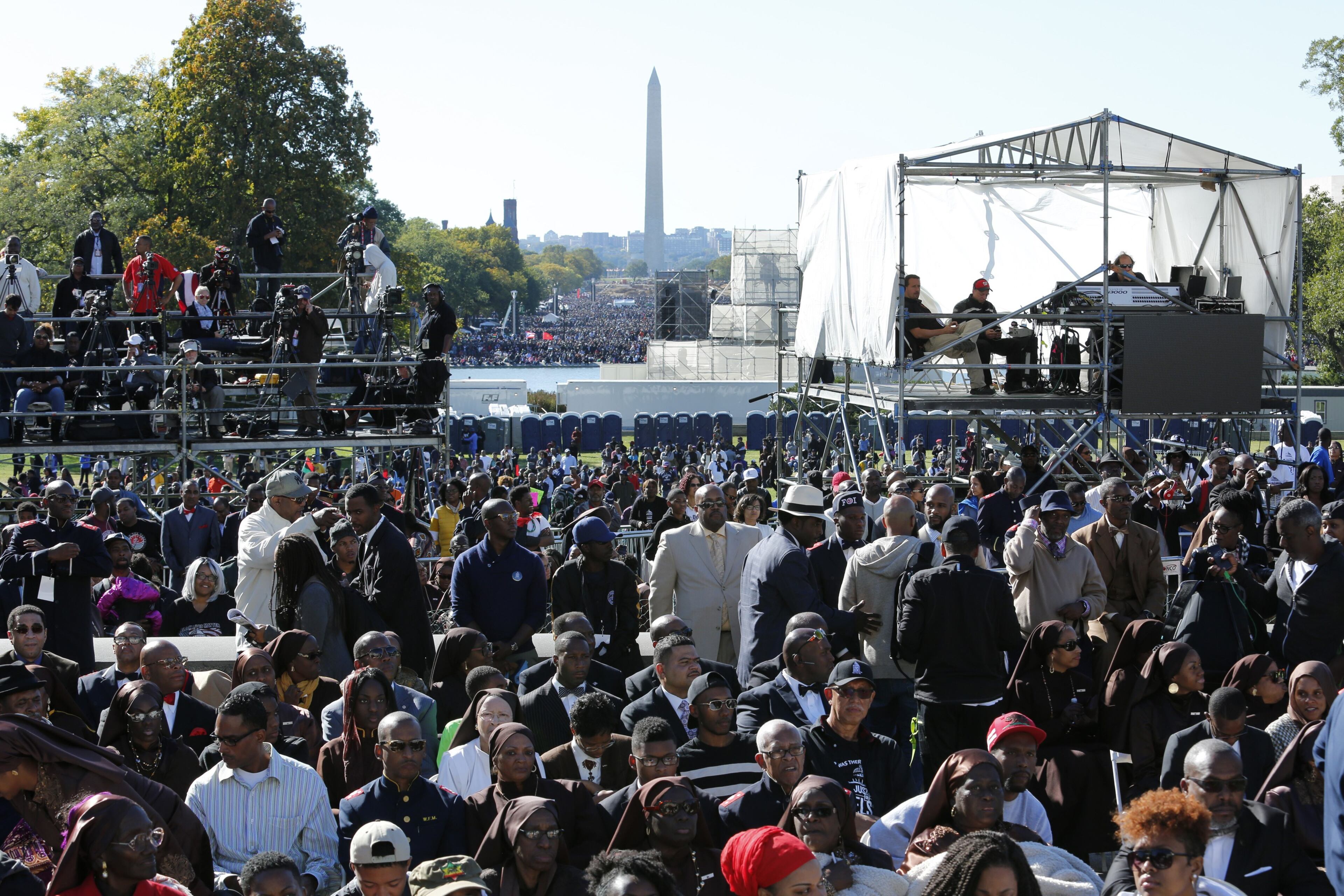 People attend the Justice or Else! rally on Capitol Hill in Washington on October 10, 2015. The rally commemorates the 20th anniversary of the Million Man March which took place on October 16, 1995. AFP PHOTO/YURI GRIPAS (Photo credit should read YURI GRIPAS/AFP/Getty Images)