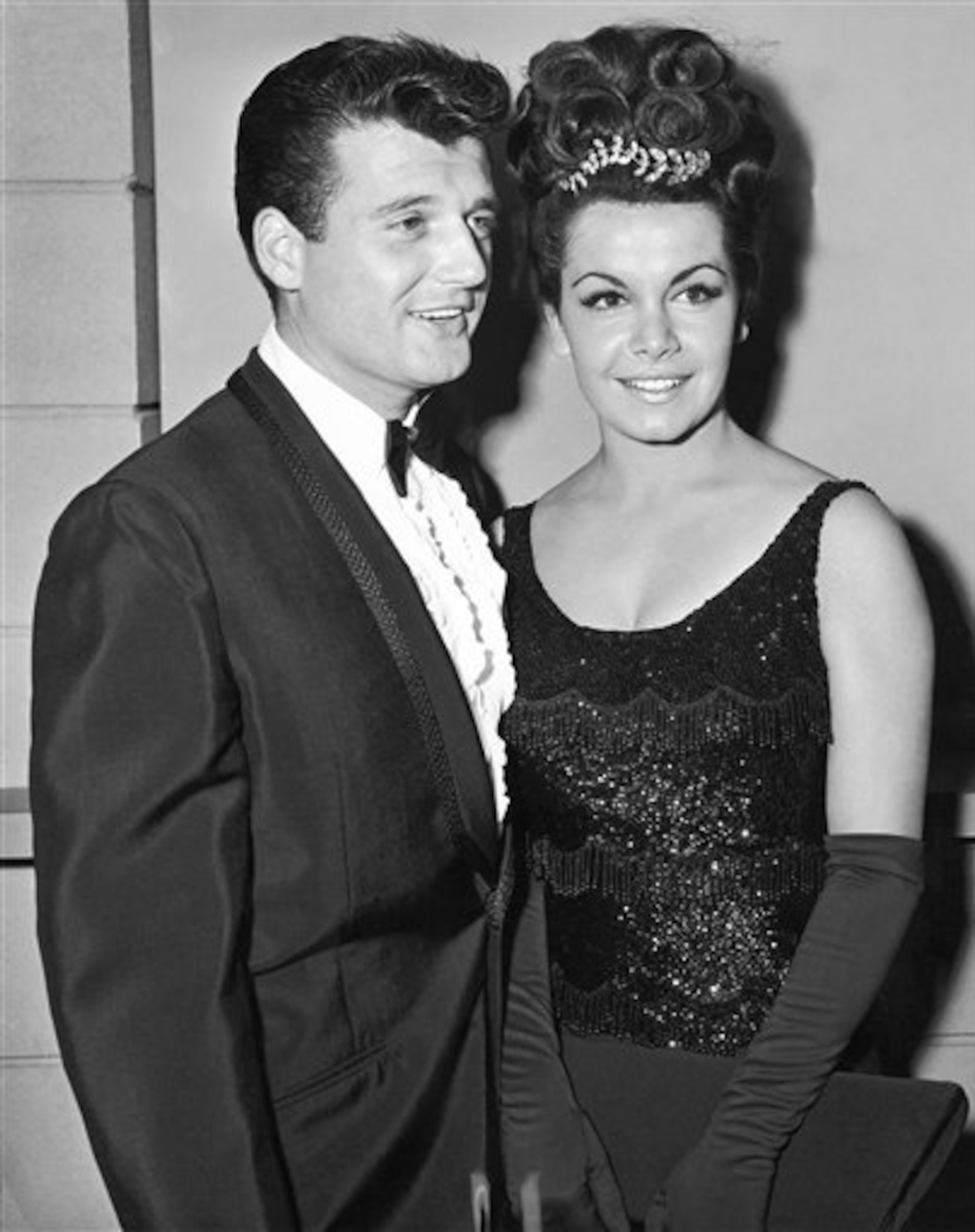 Actress Annette Funicello, a member of the Disney Mousketeers in her younger days, poses with her husband-to-be, her manager, Jack Gilardi in Hollywood on Nov. 17, 1964. Annette says they'll be married on January 9. (AP Photo)