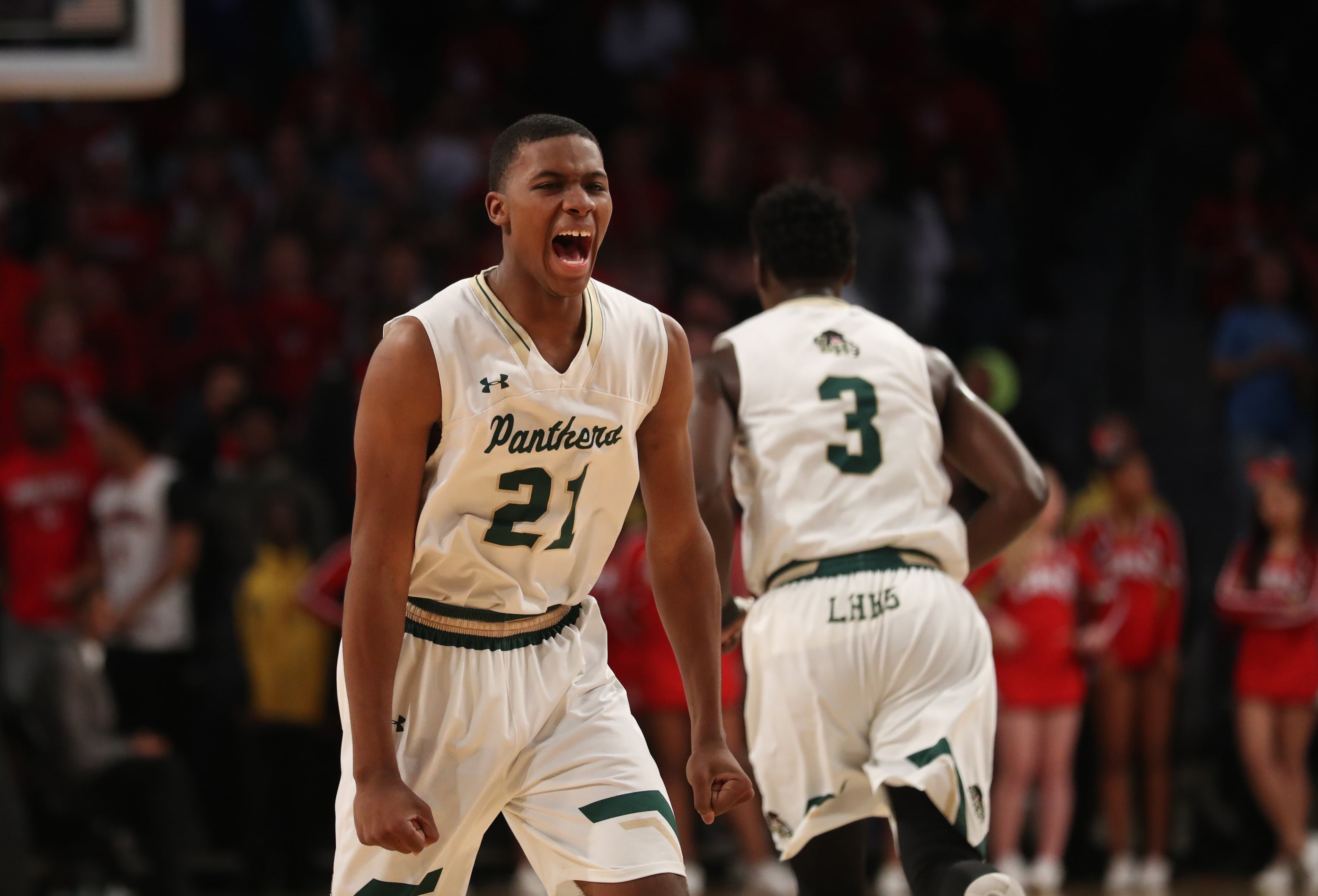 March 9, 2018 - Atlanta, Ga: Hughes guard Landers Nolley (21) reacts to a play during the second half against Gainesville in the GHSA Class AAAAAA Boys State Championship at McCamish Pavilion Friday, March 9, 2018, in Atlanta. Hughes won 85-78. PHOTO / JASON GETZ