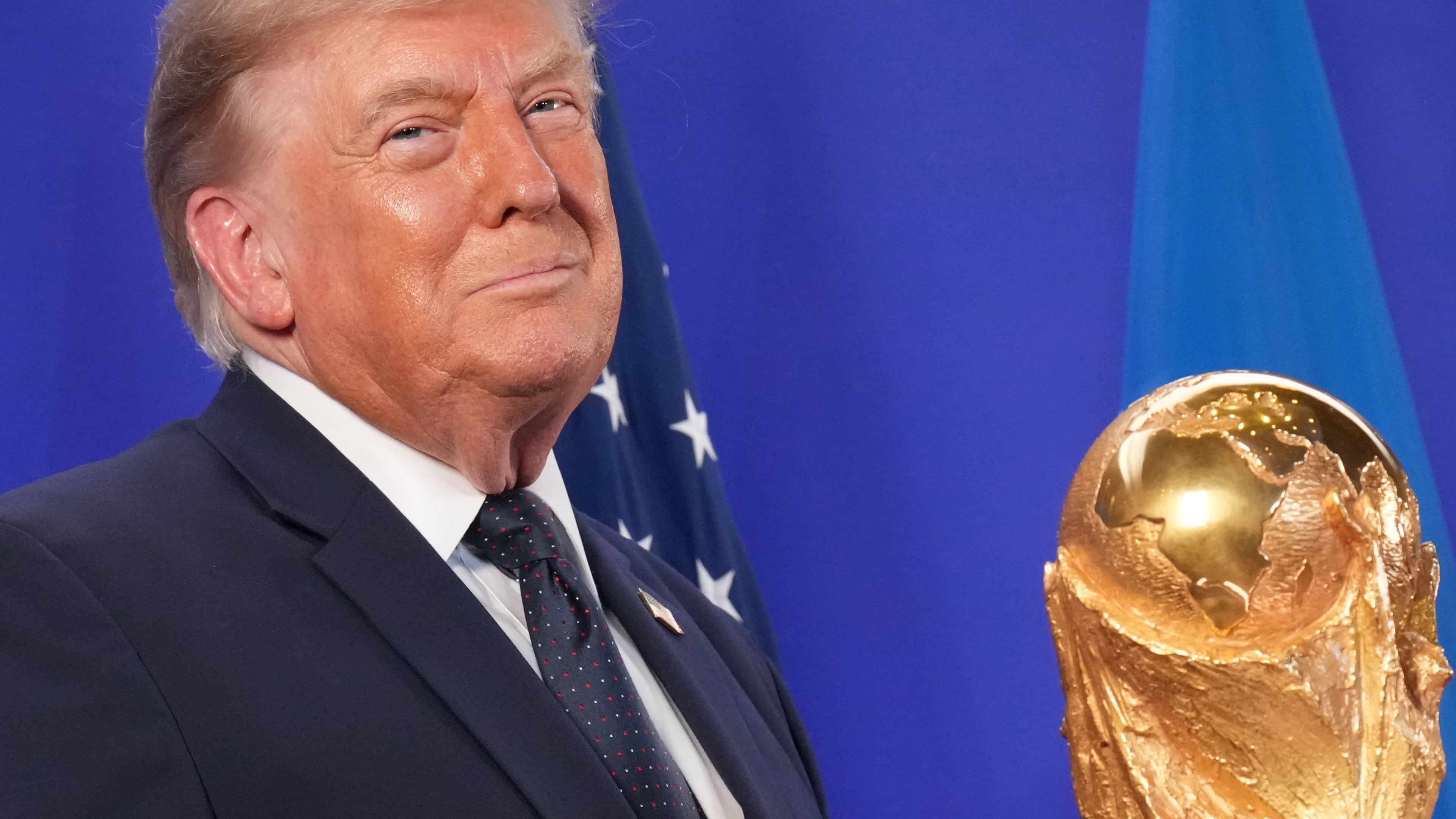 President Donald Trump listens as FIFA President Gianni Infantino speaks at a reception at Trump Tower in New York, Friday, July 17, 2026. (AP Photo/Jacquelyn Martin)