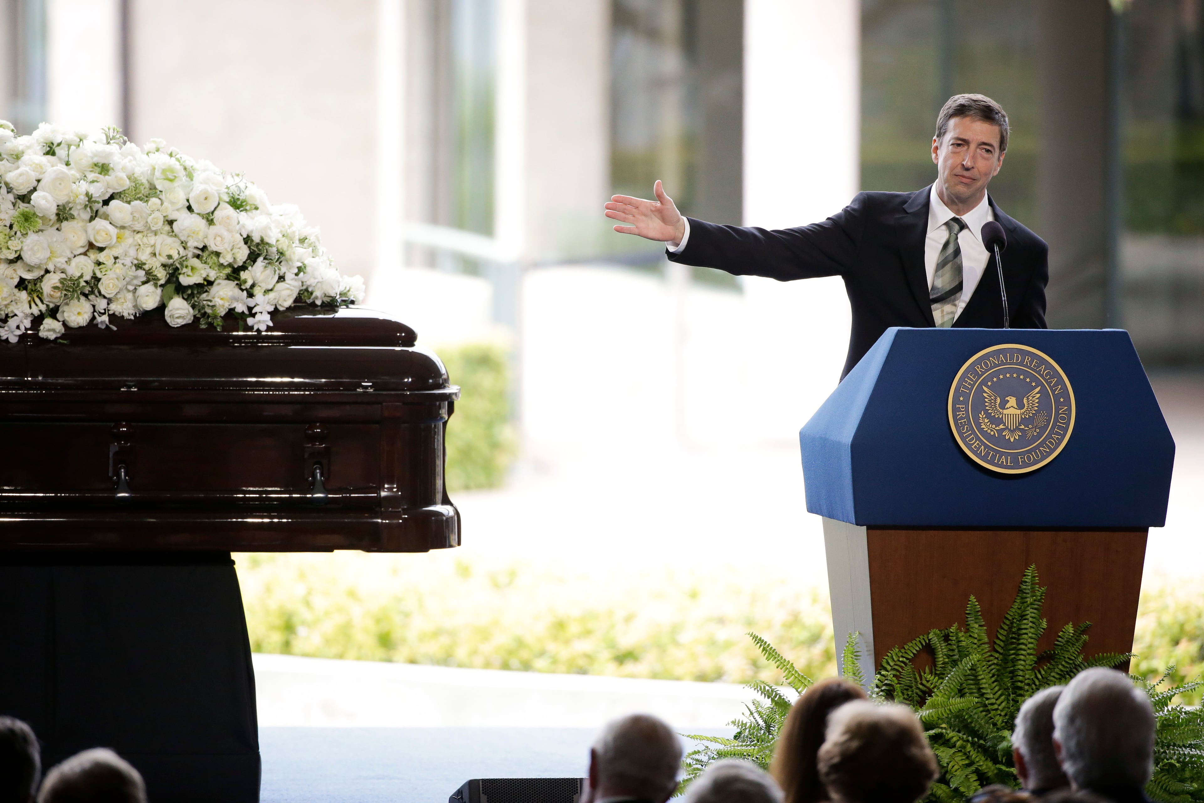Ron Reagan, son of late former President Ronald Reagan and Nancy Reagan speaks during the funeral service for the former First Lady at the Ronald Reagan Presidential Library Friday, March 11, 2016, in Simi Valley, Calif. (AP Photo/Jae C. Hong)