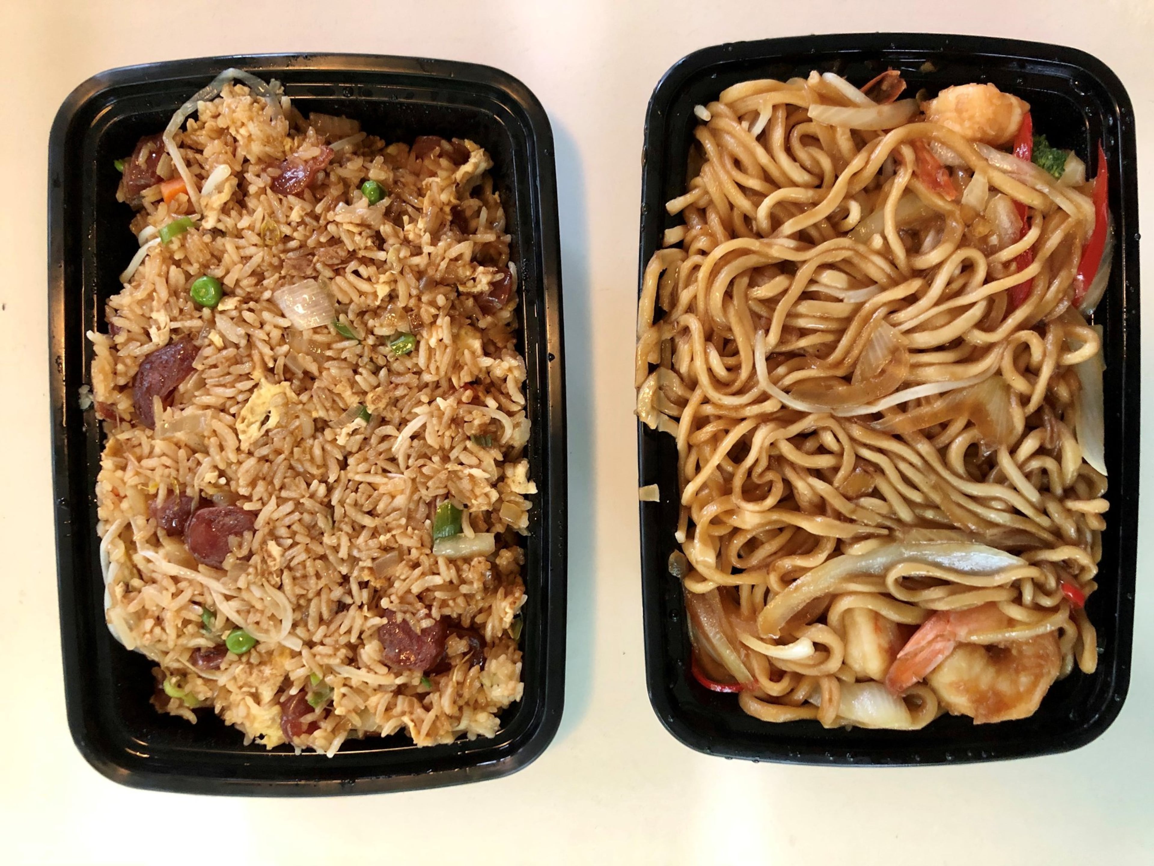Among the dishes available for takeout from LanZhao Ramen are sausage fried rice and a stir-fry of hand-pulled noodles with shrimp. CONTRIBUTED BY WENDELL BROCK
