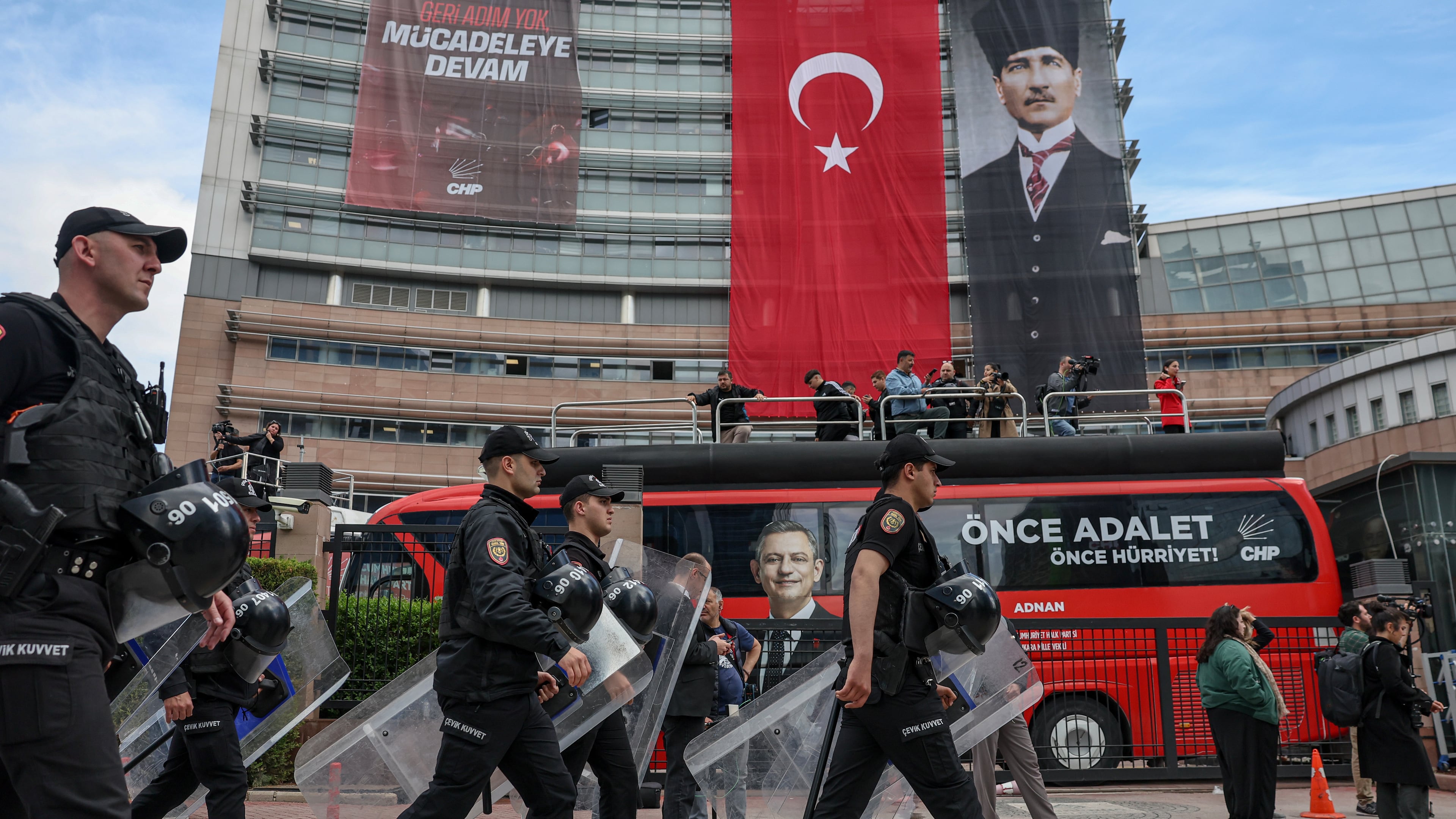 Police officers arrive at Turkey's main opposition Republican People's Party (CHP) headquarters in Ankara, Sunday, May 24, 2026, to evict supporters gathered inside. (Ugur Yildirim/DIA Photo via AP)