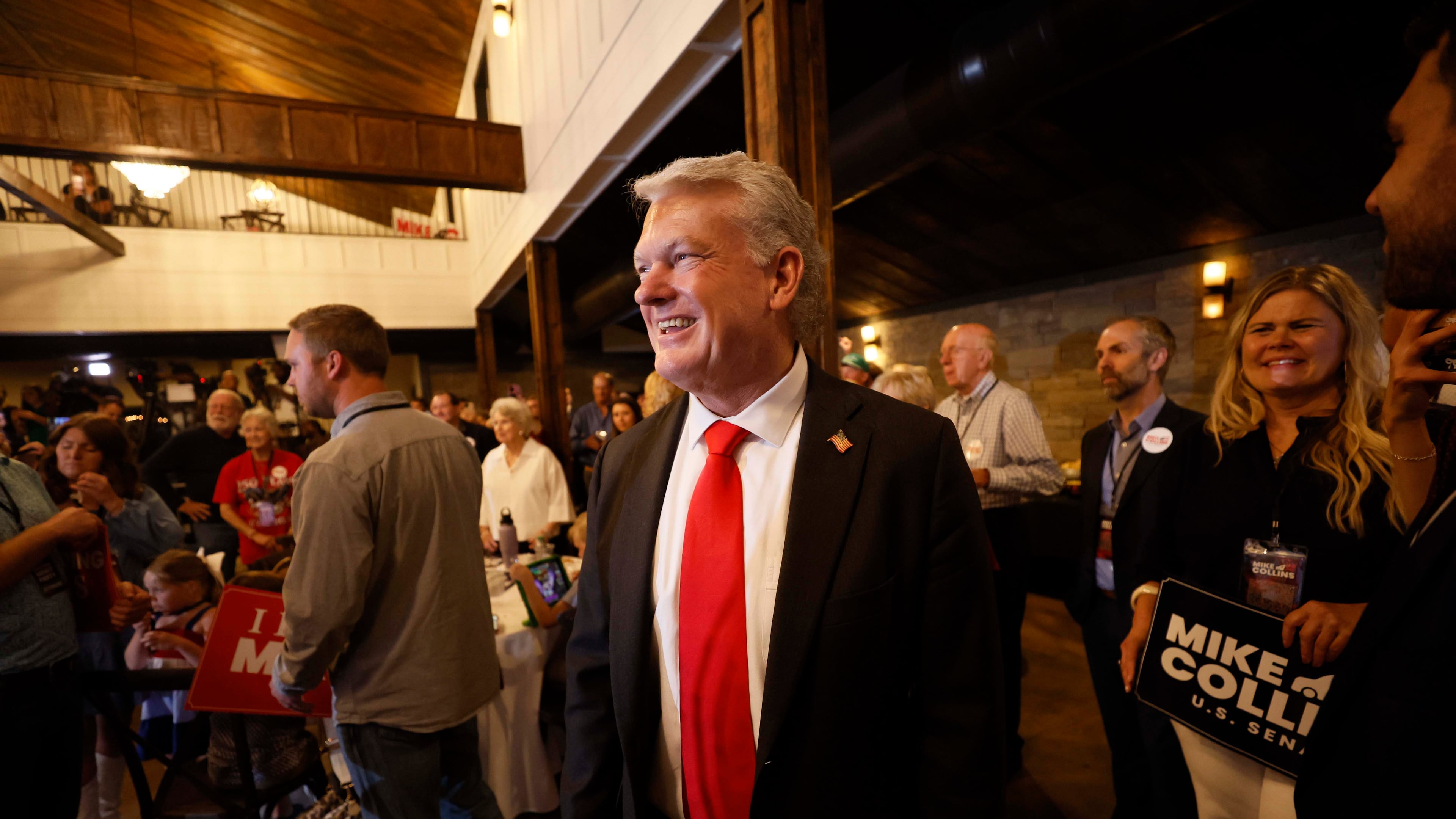 U.S. Rep. Mike Collins prepares to give a speech during his runoff election watch party at Seven Oaks Manor in Jackson last Tuesday. (Miguel Martinez/AJC)