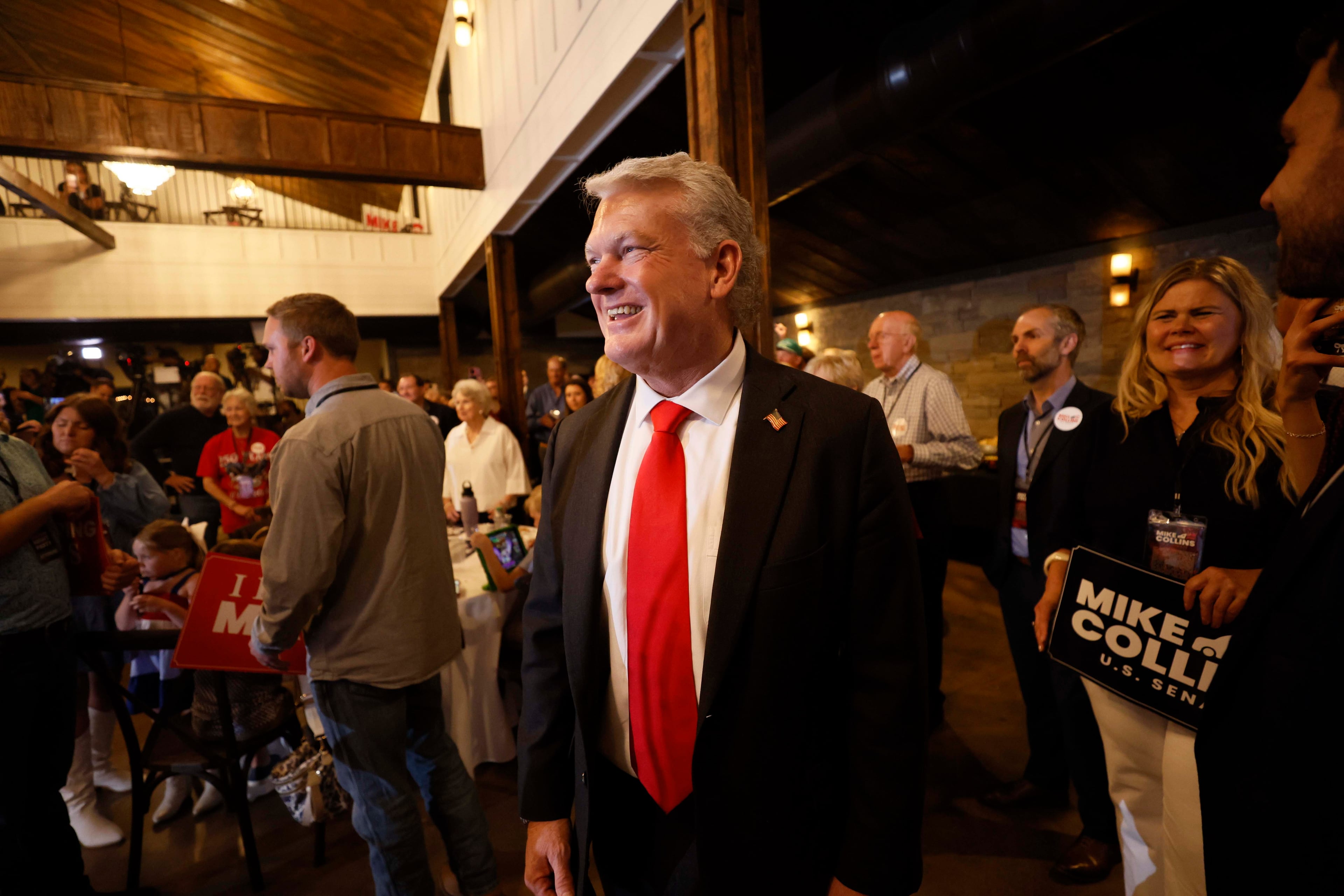 U.S. Rep. Mike Collins prepares to give a speech during his runoff election watch party at Seven Oaks Manor in Jackson last Tuesday. (Miguel Martinez/AJC)