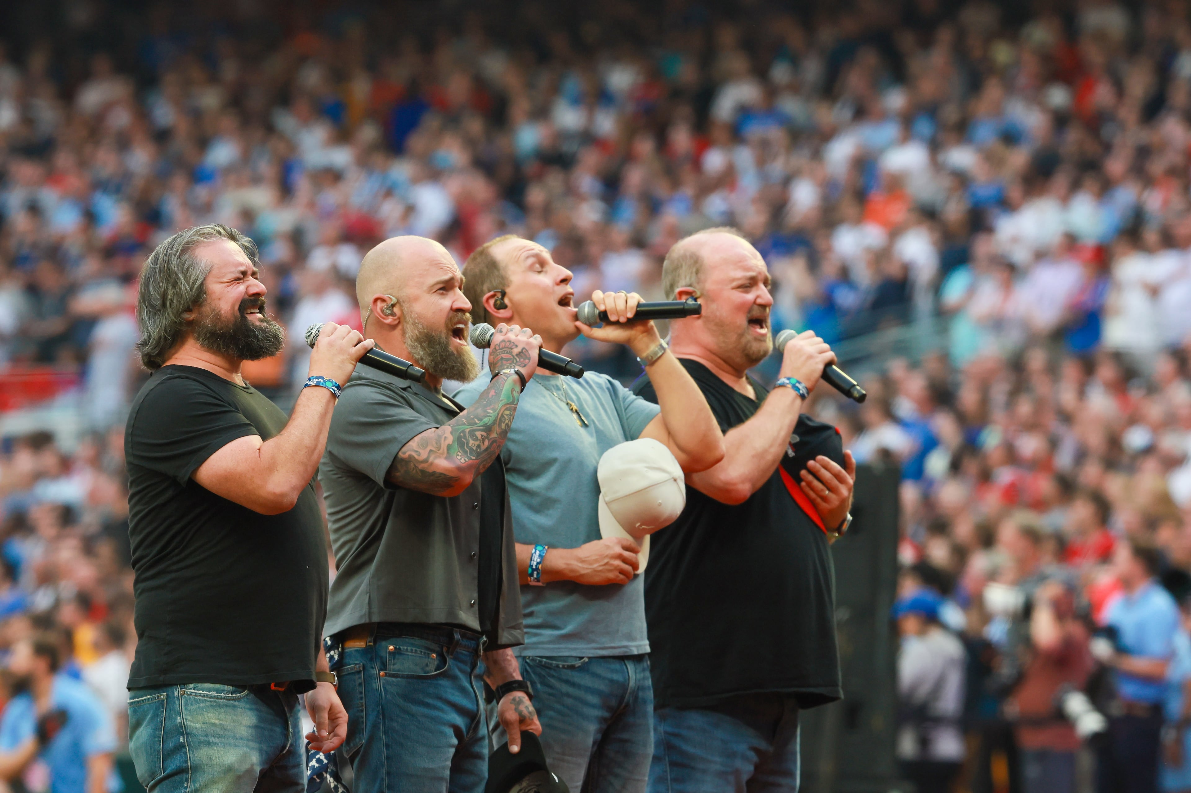 The Zac Brown Band sings the US national anthem to begin the MLB All-Star Game at Truist Park in Atlanta on Tuesday, July 15, 2025. (Jason Getz/AJC)