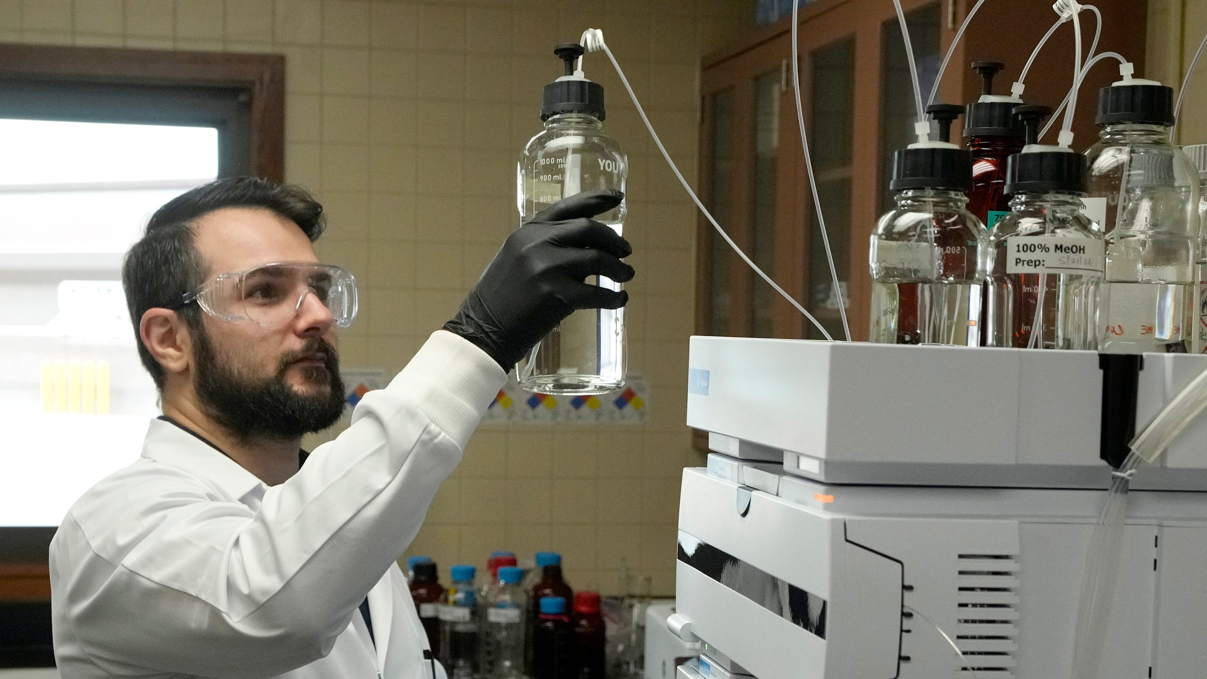 Michael Serpa, senior scientist at the Scottsdale Water Campus, works on water testing, Wednesday, Sept. 9, 2026, in Scottsdale, Ariz. (AP Photo/Ross D. Franklin)