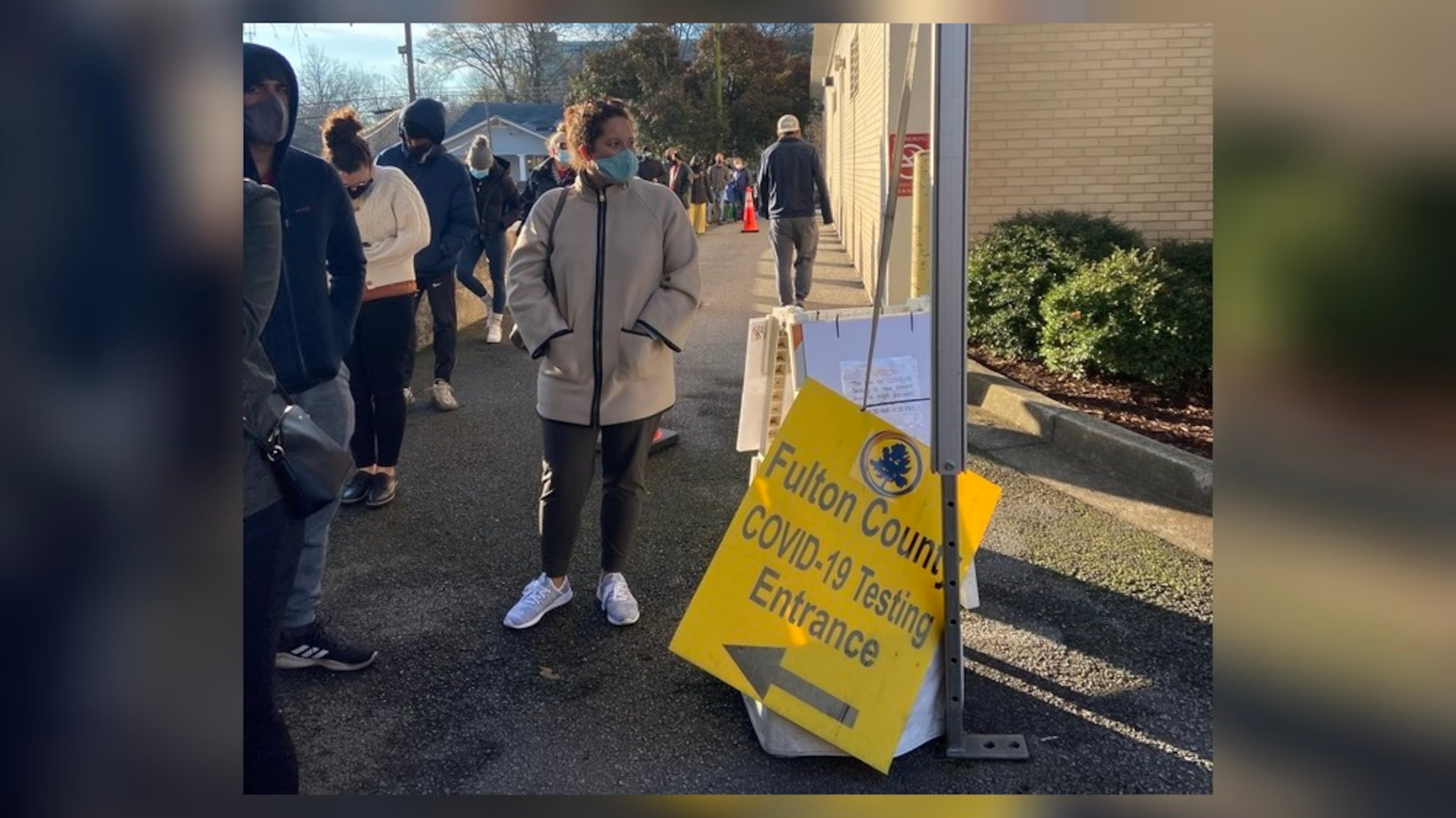 More than 100 people were in line Wednesday morning at Fulton County's COVID-19 testing site off Boulevard.
