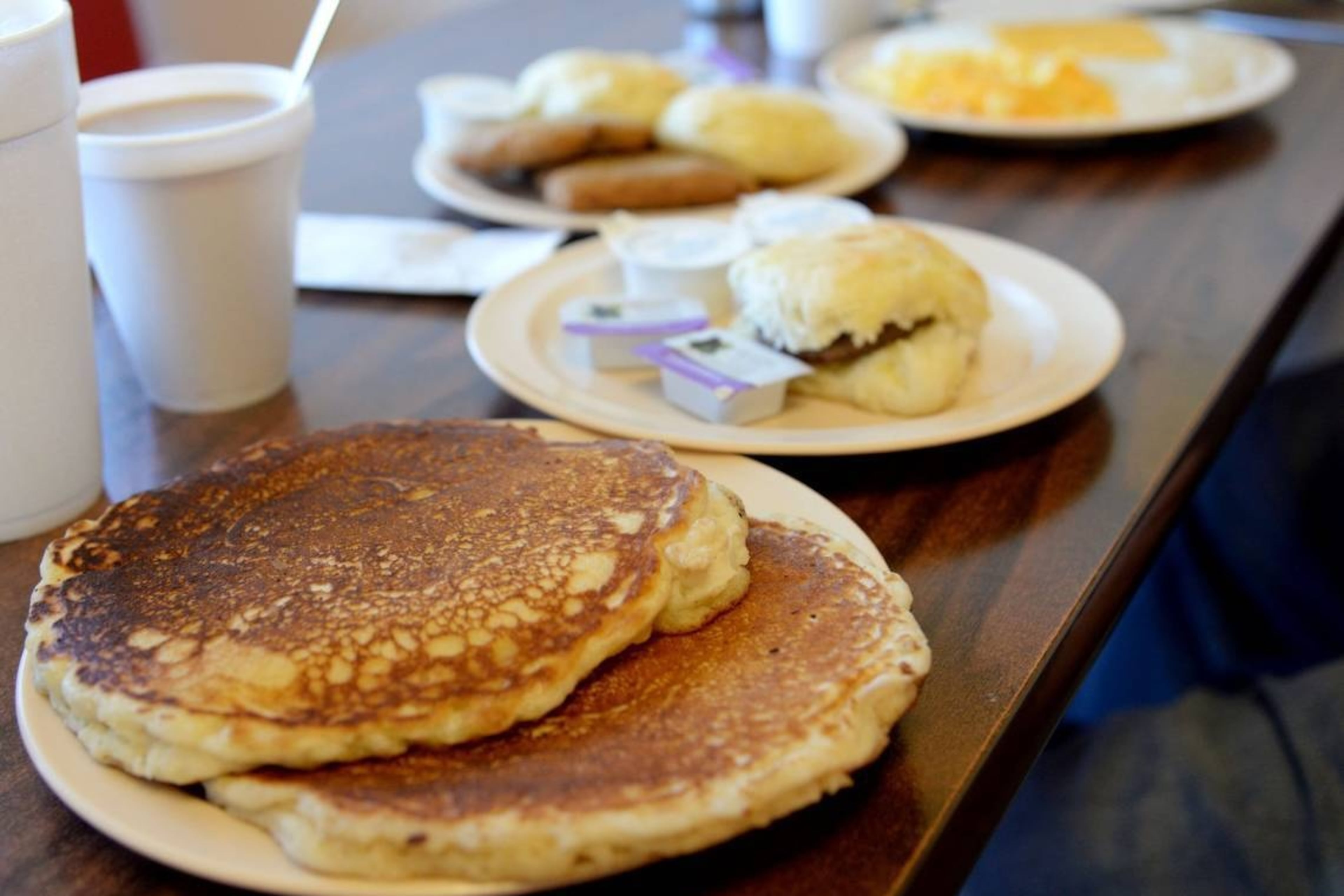 Among the breakfast dishes available at Johhny V's in Macon are pancakes and sausage biscuits. (Courtesy of Jenna Eason/The Telegraph)