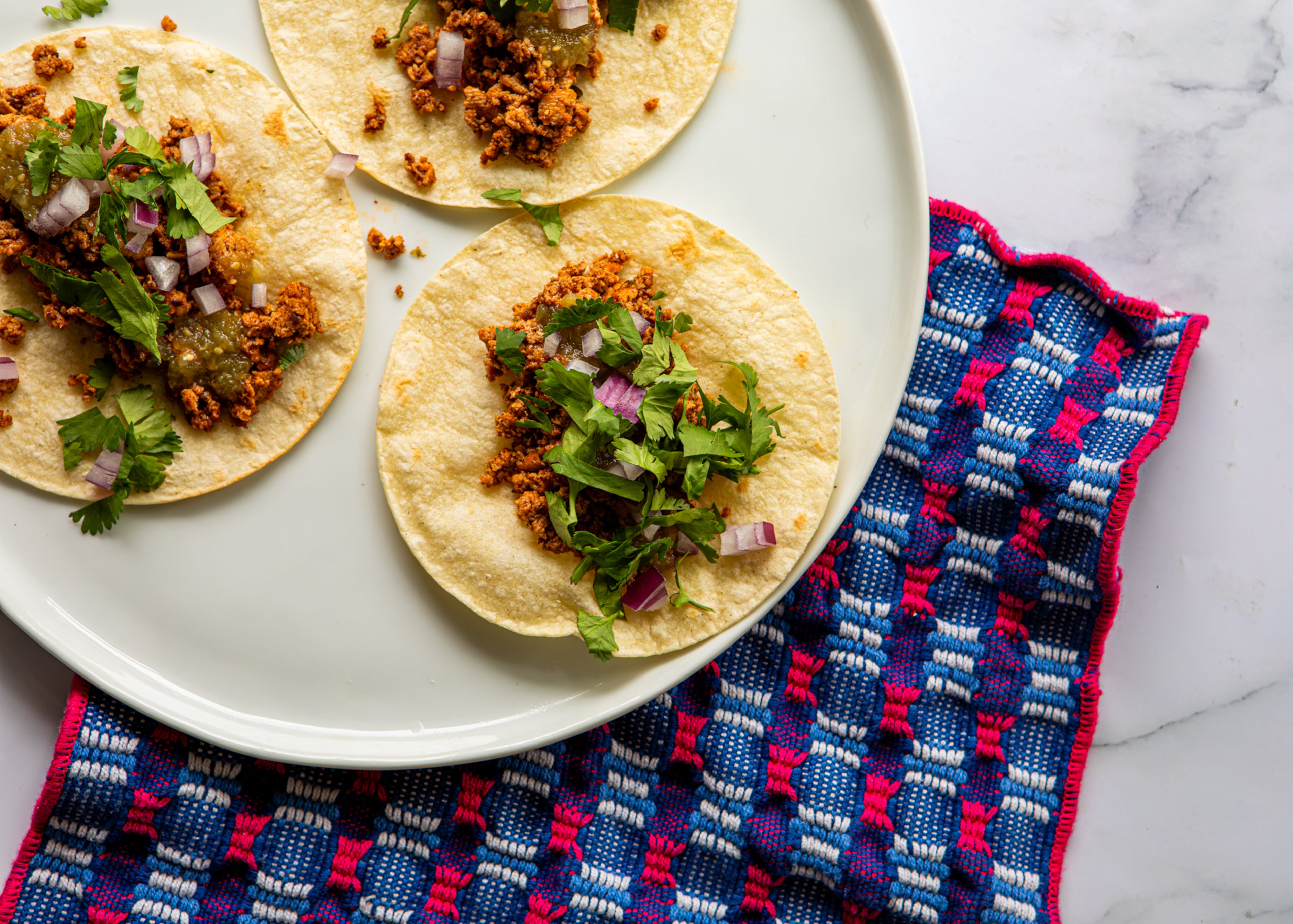 For a meatier texture, freeze, then thaw your tofu before cooking recipes like these tofu tacos. (Aaliyah Man for the AJC/food styling by Kate Williams)