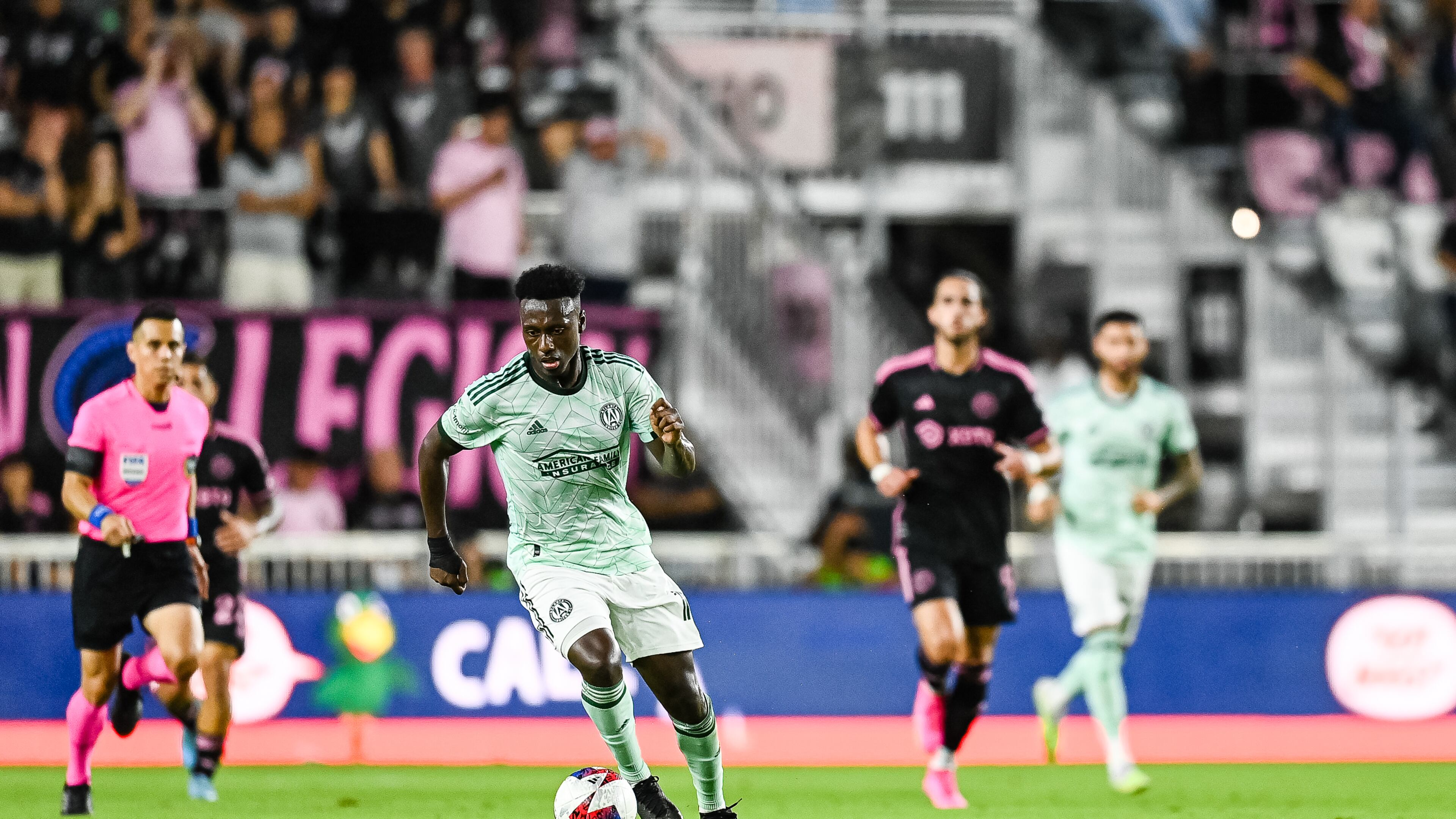 Atlanta United midfielder Derrick Etienne Jr. #18 dribbles the ball during the match against Inter Miami at DRV PNK Stadium in Fort Lauderdale, FL on Saturday May 6, 2023. (Photo by Mitchell Martin/Atlanta United)
