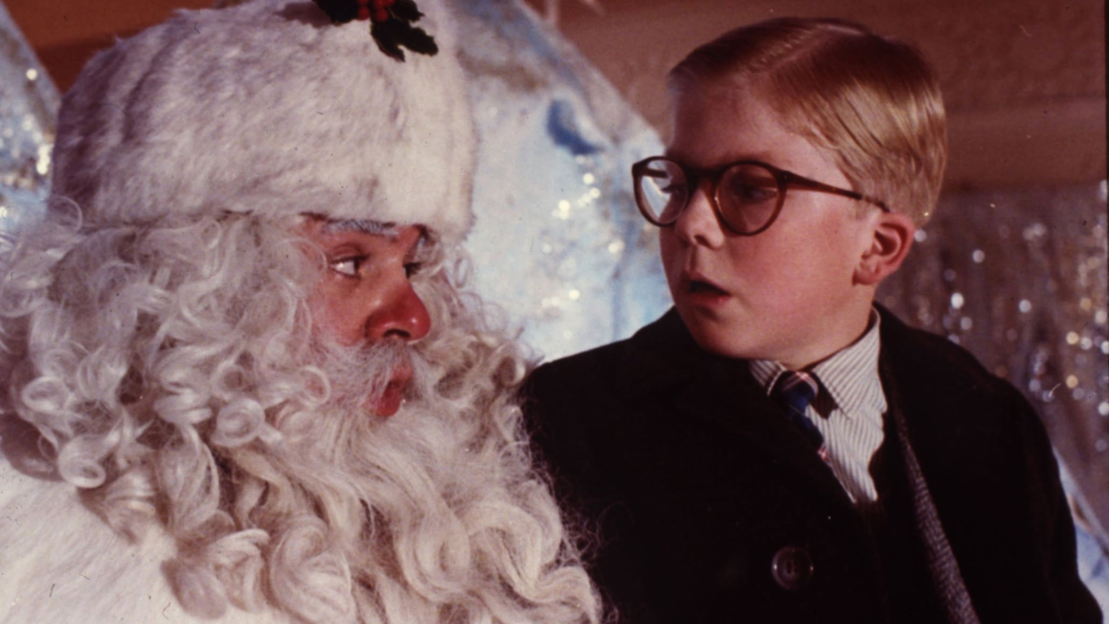 Ralphie (Peter Billingsley) visits a department store Santa (Jeff Gillen) as part of his campaign to find a BB gun under his tree in the classic holiday film “A Christmas Story.” Contributed by MGM