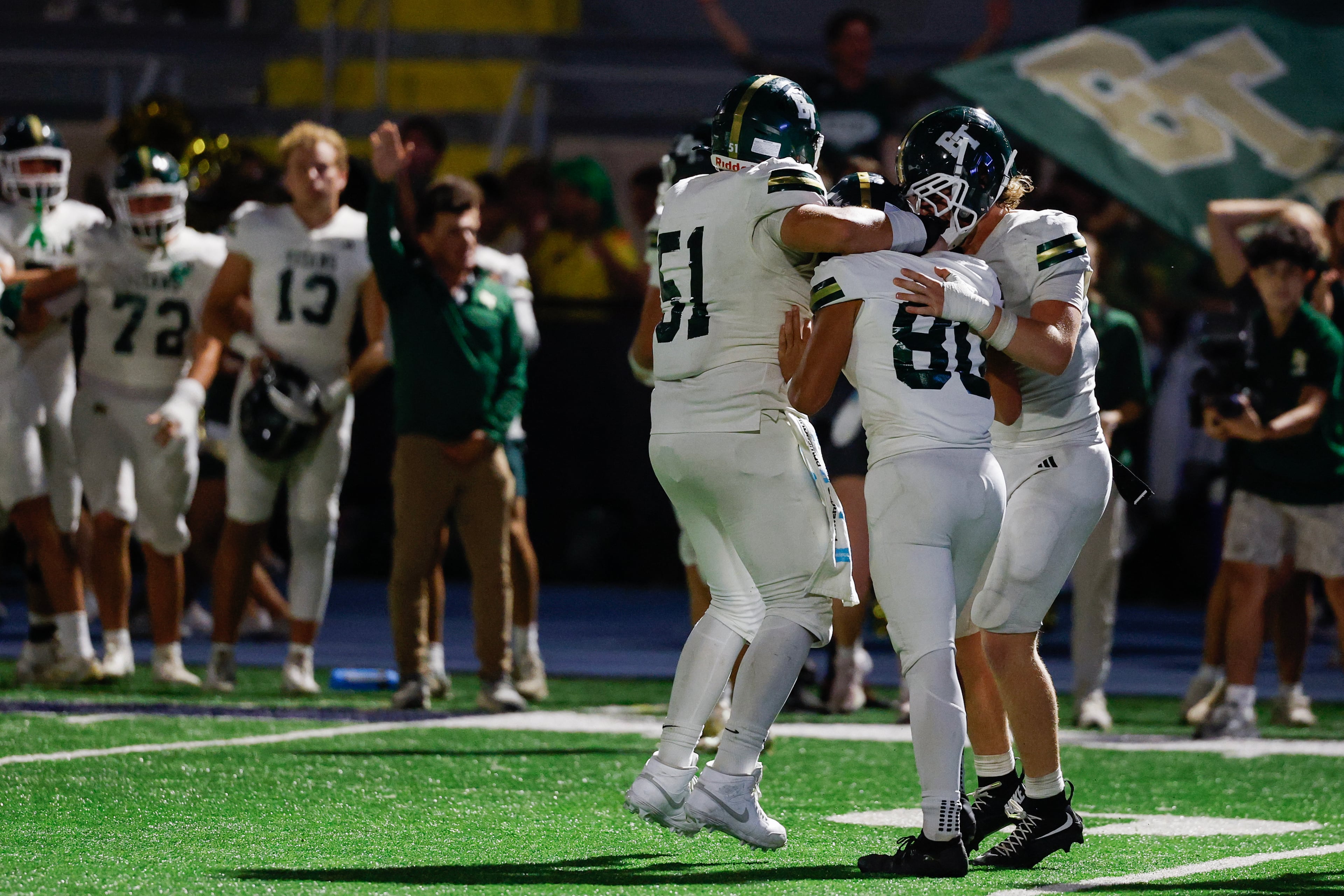 Blessed Trinity’s Richard Morthland (center) is mobbed by his teammates after kicking the game-winning field goal against Marist on Friday, Sept. 25, 2026, in Atlanta. (Erik S. Lesser for the AJC)