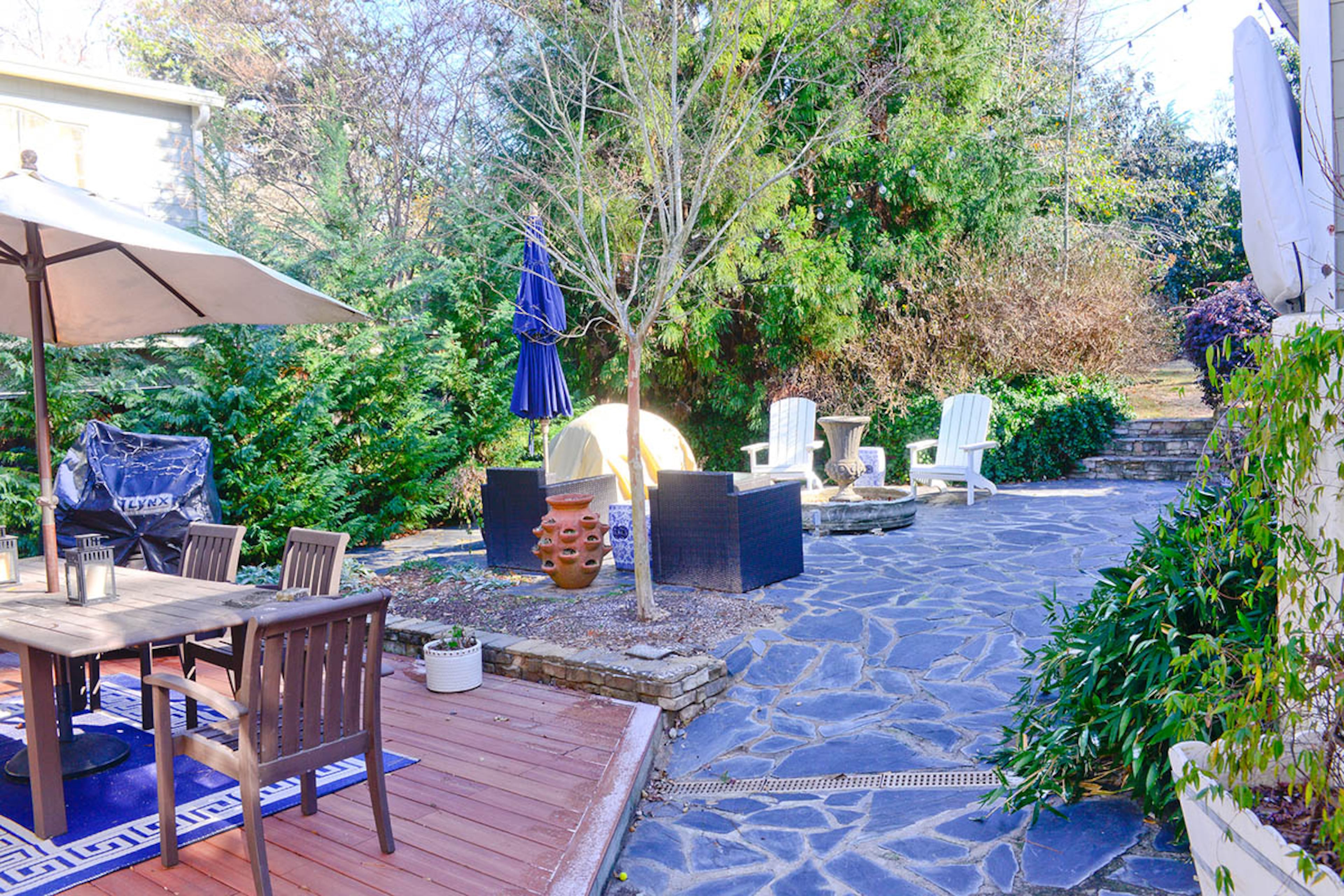 The large stone patio and eating area behind the home is great for entertaining or relaxing with their daughter. "Caroline loves playing back there when the weather is nice, and we can just sit back with a glass of wine and watch her play without worry," Katie Luepke said.