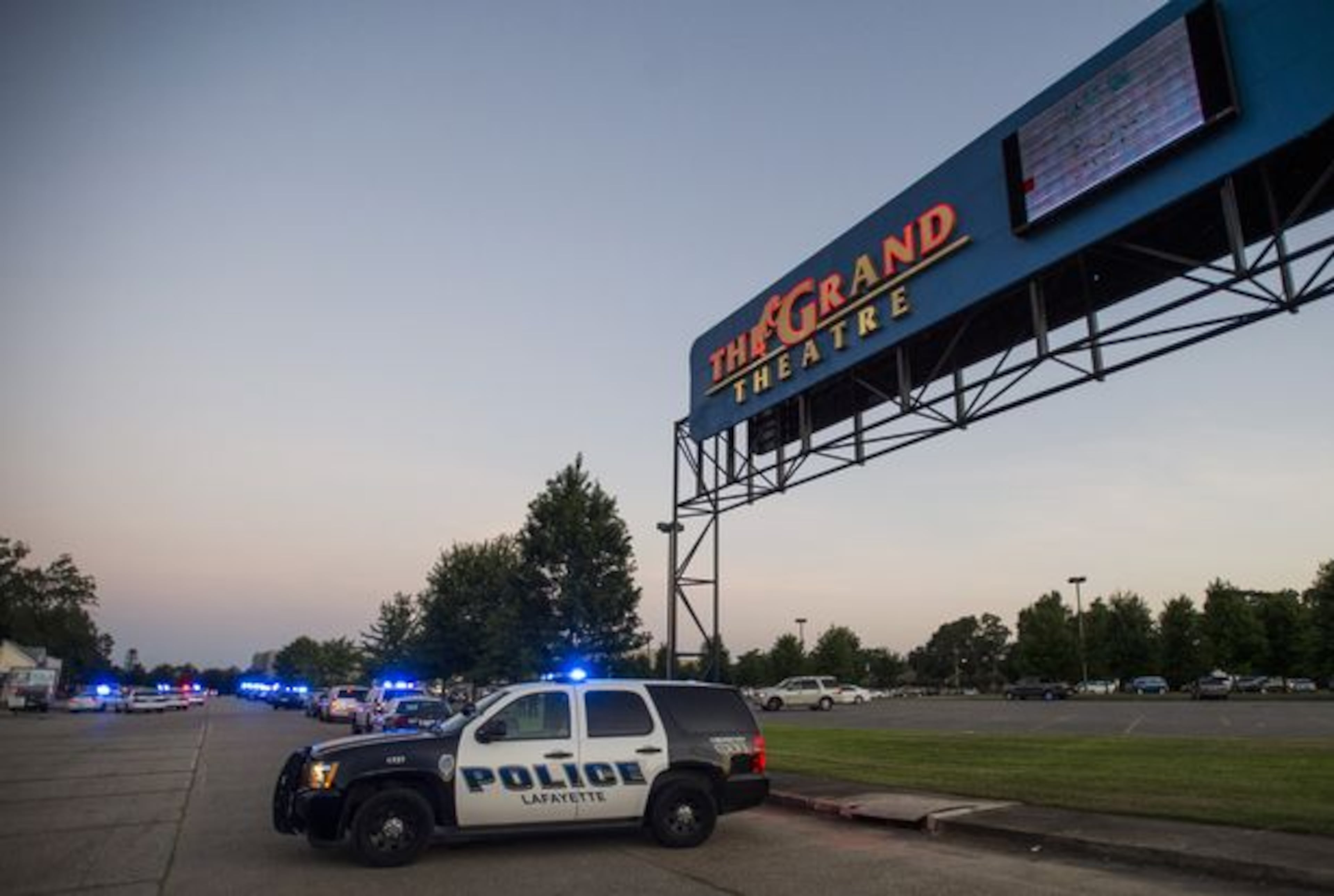 Police surround the scene following a shooting at a movie theater Thursday, July 23, 2015, in Lafayette, La. (AP)