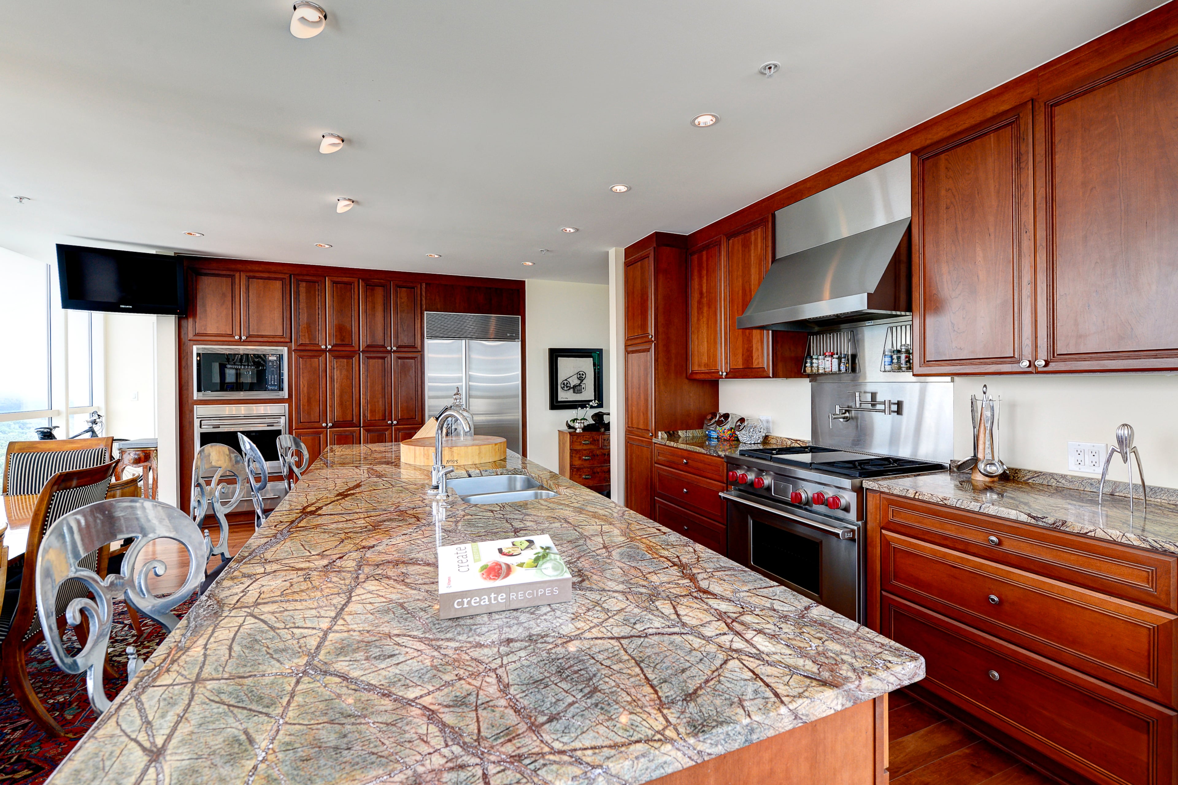 The home offers two additional terraces and three bedrooms suites including a master with an office and dressing room. Significant upgrades can be seen throughout this one-of-a-kind space. For more information about this home, please visit www.harrynorman.com.