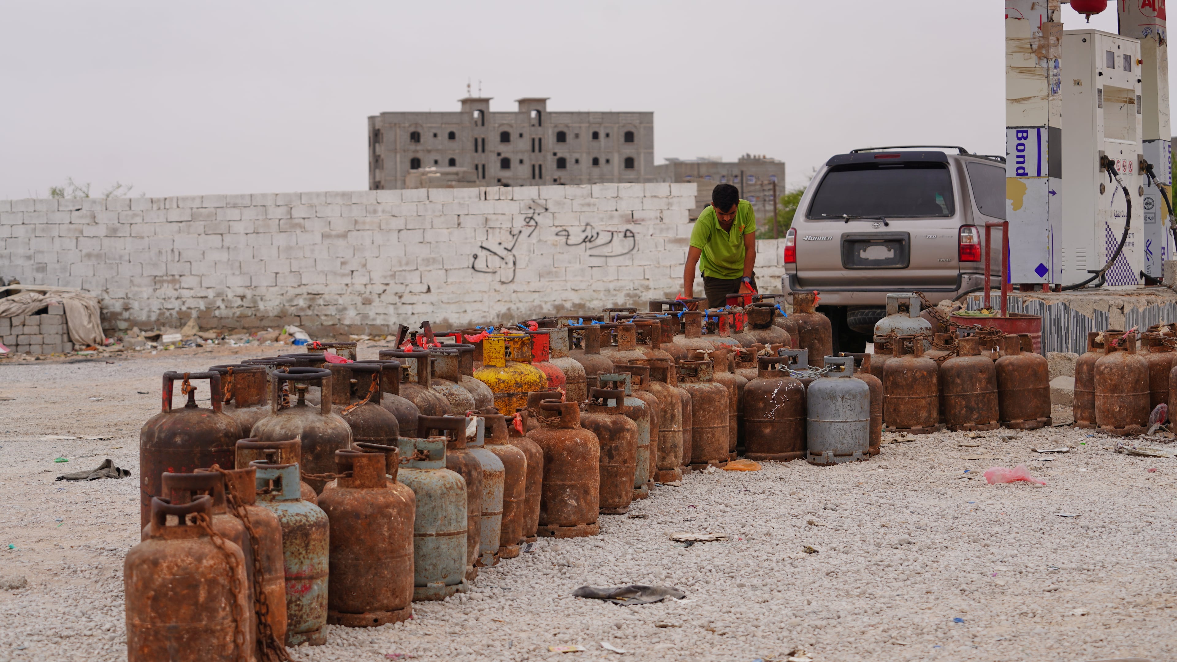 A worker prepares gas cylinders for refilling at a gas station in Mahra, Yemen, Wednesday, Sept. 9, 2026. (AP Photo/Abdulnasser Alseddik)