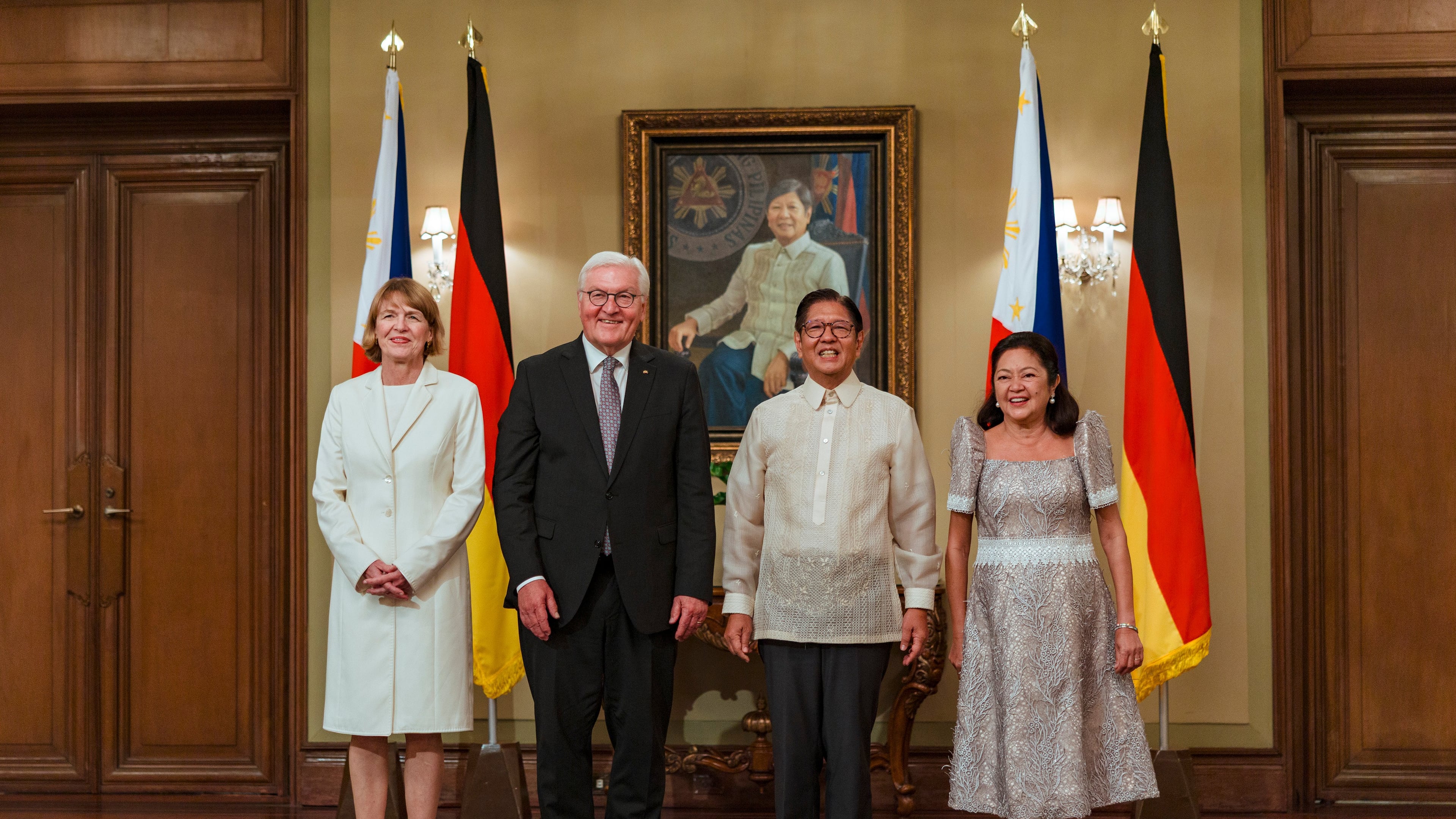 German President Frank-Walter Steinmeier, center left, with his wife Elke Budenbender, left, and Philippine President Ferdinand Marcos Jr. with his wife Liza Araneta Marcos pose for pictures in Manila, Philippines Tuesday, June 16, 2026. (Ezra Acayan/Pool Photo via AP)