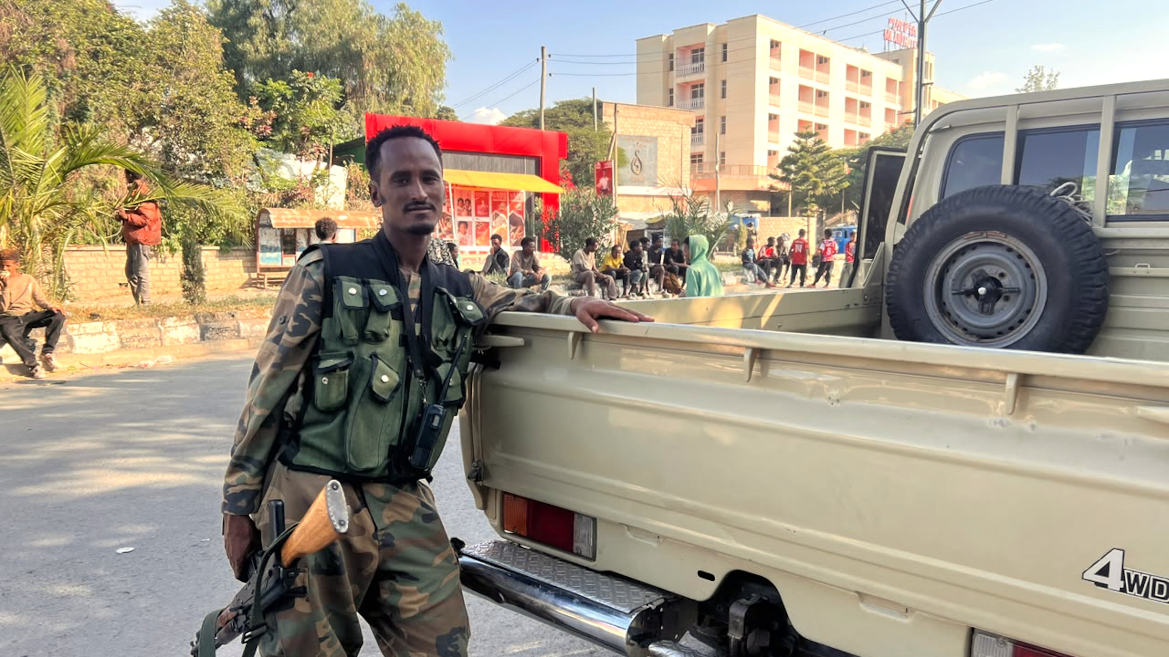 Tigray Peace Force fighters stand in a road after entering Mekelle, in Ethiopia's Tigray region, Sunday, Oct. 4, 2026. (AP Photo/Filmon Equar Hailu)