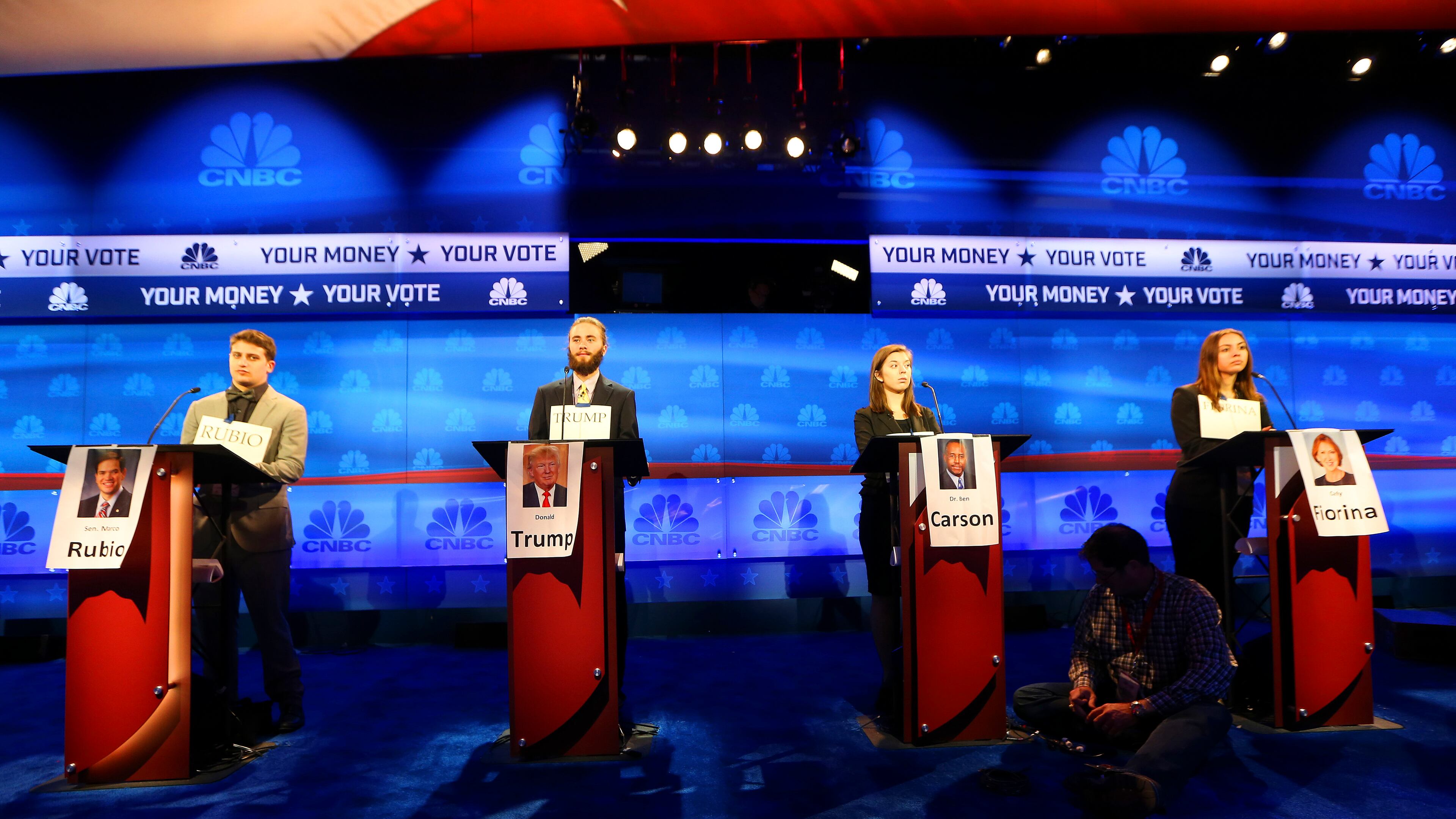 Student stand-ins man the podiums during preparations for Wednesday nights debate of Republican presidential candidates at the University of Colorado in Boulder, Oct. 27, 2015. The third GOP debate will be on CNBC, which plans to center the debate around its bread-and-butter topics: business, the economy and money. (Jim Wilson/The New York Times)