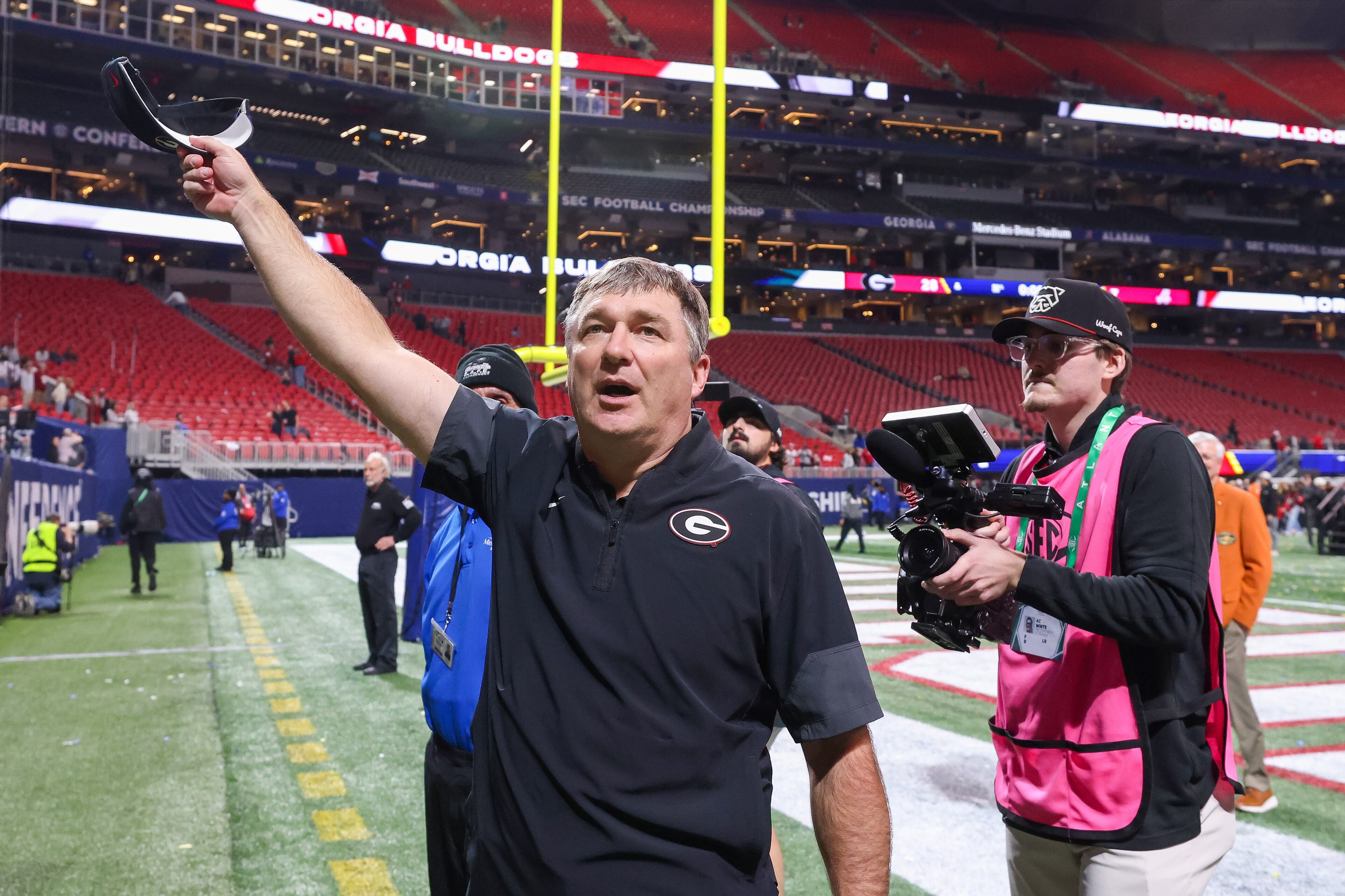 Georgia head coach Kirby Smart celebrates a 28-7 victory over Alabama in the SEC Championship game at Mercedes-Benz Stadium, Saturday, Dec. 6, 2025, in Atlanta. (Jason Getz / AJC)