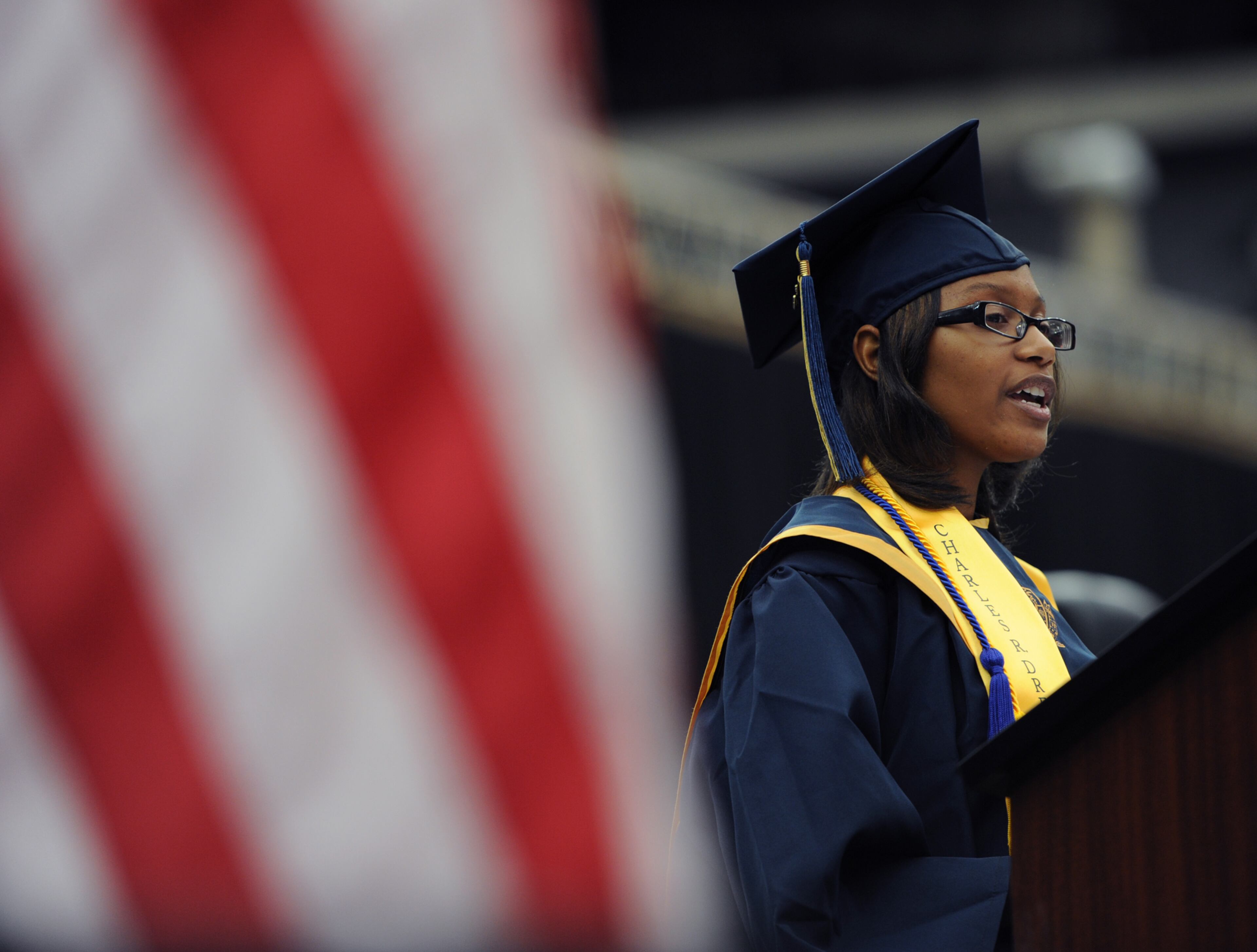 Chelesa Fearce gives her speech on Thursday, May 23 2013, at the Georgia Dome. Fearce achieved a 4.466 GPA and tested high enough to enroll in all college courses for her last two years of high school. When she enters Spelman in the fall, she will do so as a college junior.