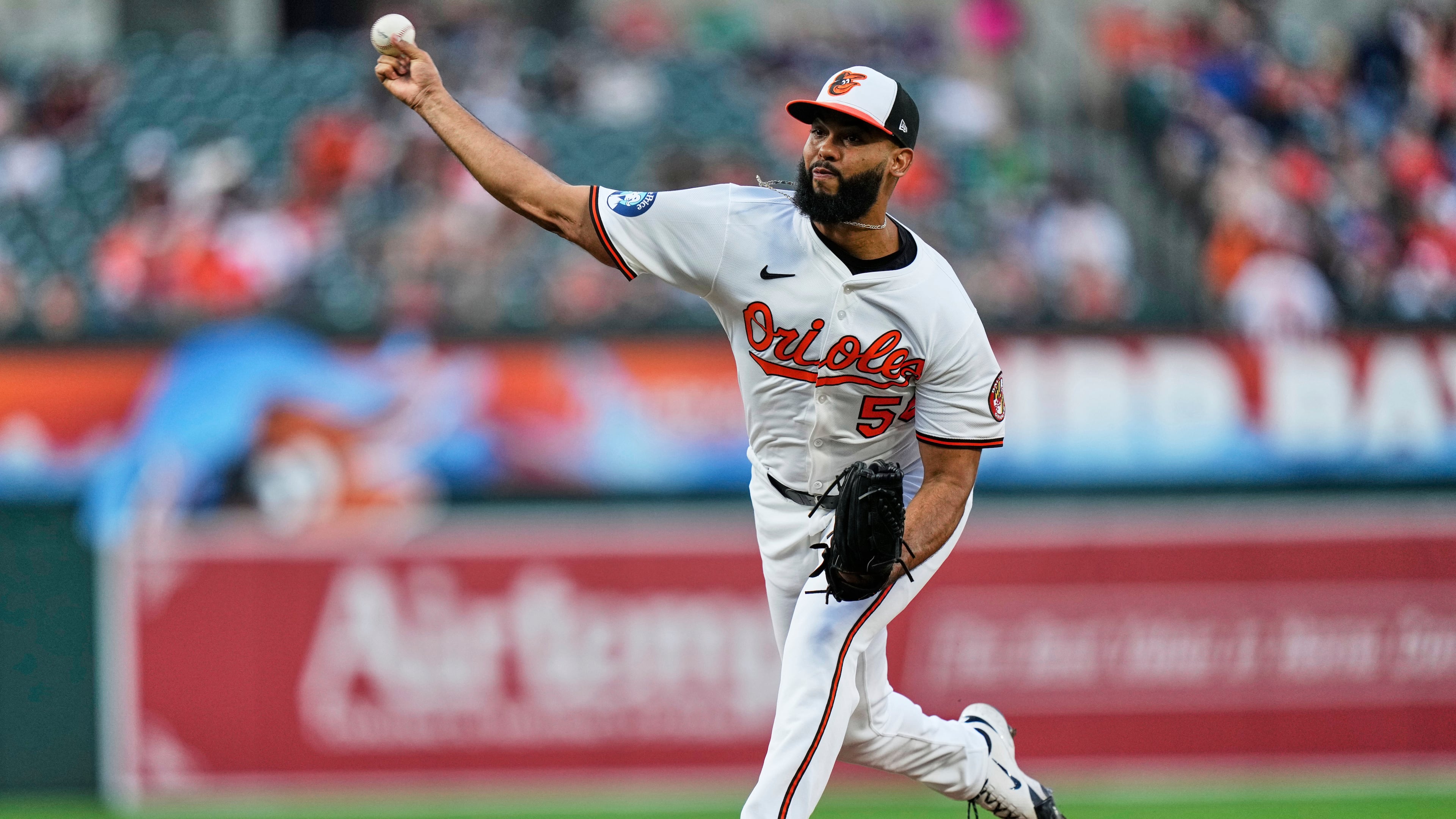 FILE - Baltimore Orioles relief pitcher Seranthony Dominguez (56) delivers during the ninth inning in the second baseball game of a doubleheader against the New York Mets, July 10, 2025, in Baltimore. (AP Photo/Stephanie Scarbrough, File)