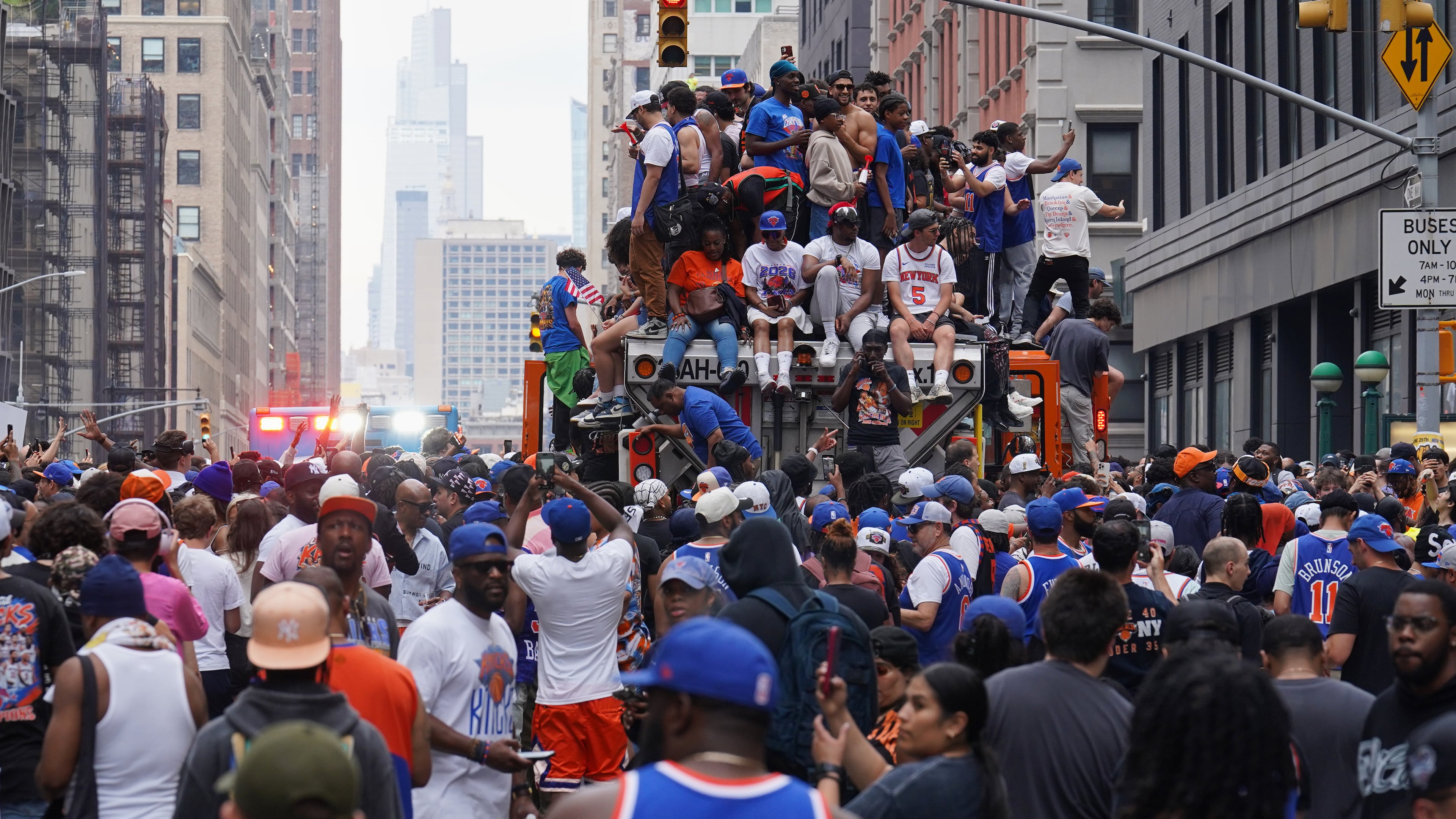 Fans celebrate during the New York Knicks' NBA championship parade Thursday, June 18, 2026, in New York. (AP Photo/Ryan Murphy)