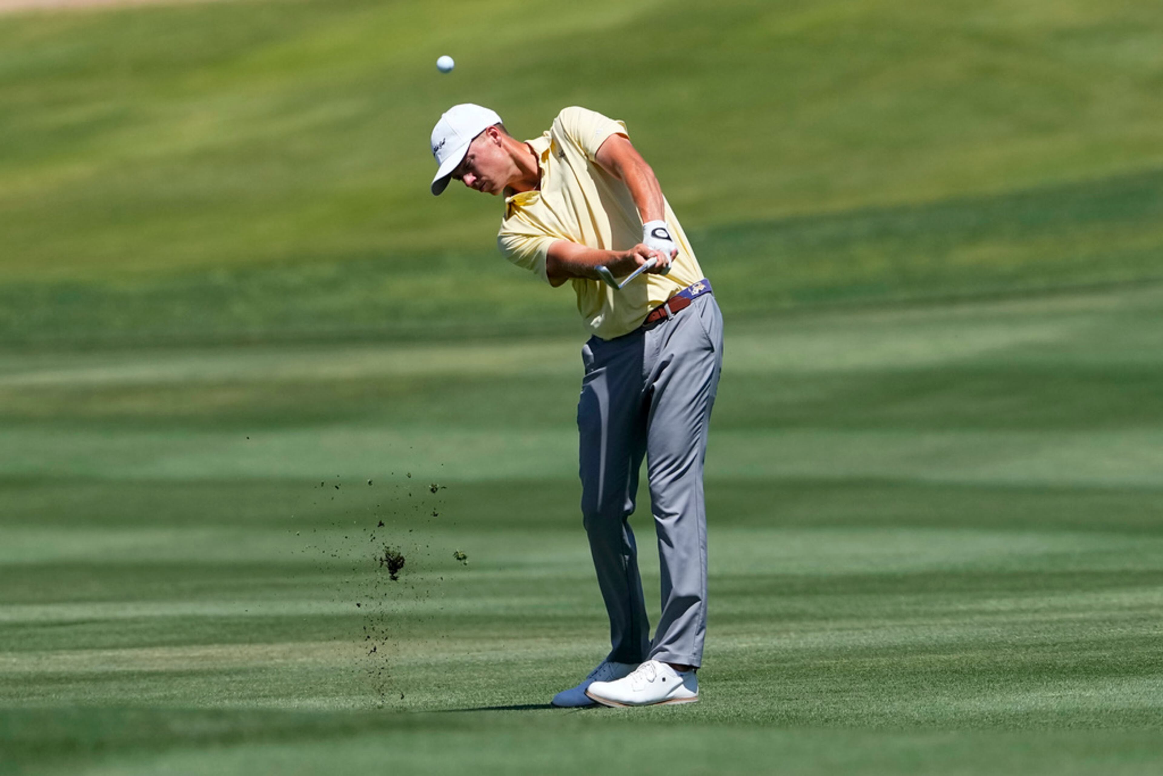 Georgia Tech golfer Connor Howe hits from the second fairway during the final round of the NCAA college men's match play golf championship, Wednesday, May 31, 2023, in Scottsdale, Ariz. (AP Photo/Matt York)