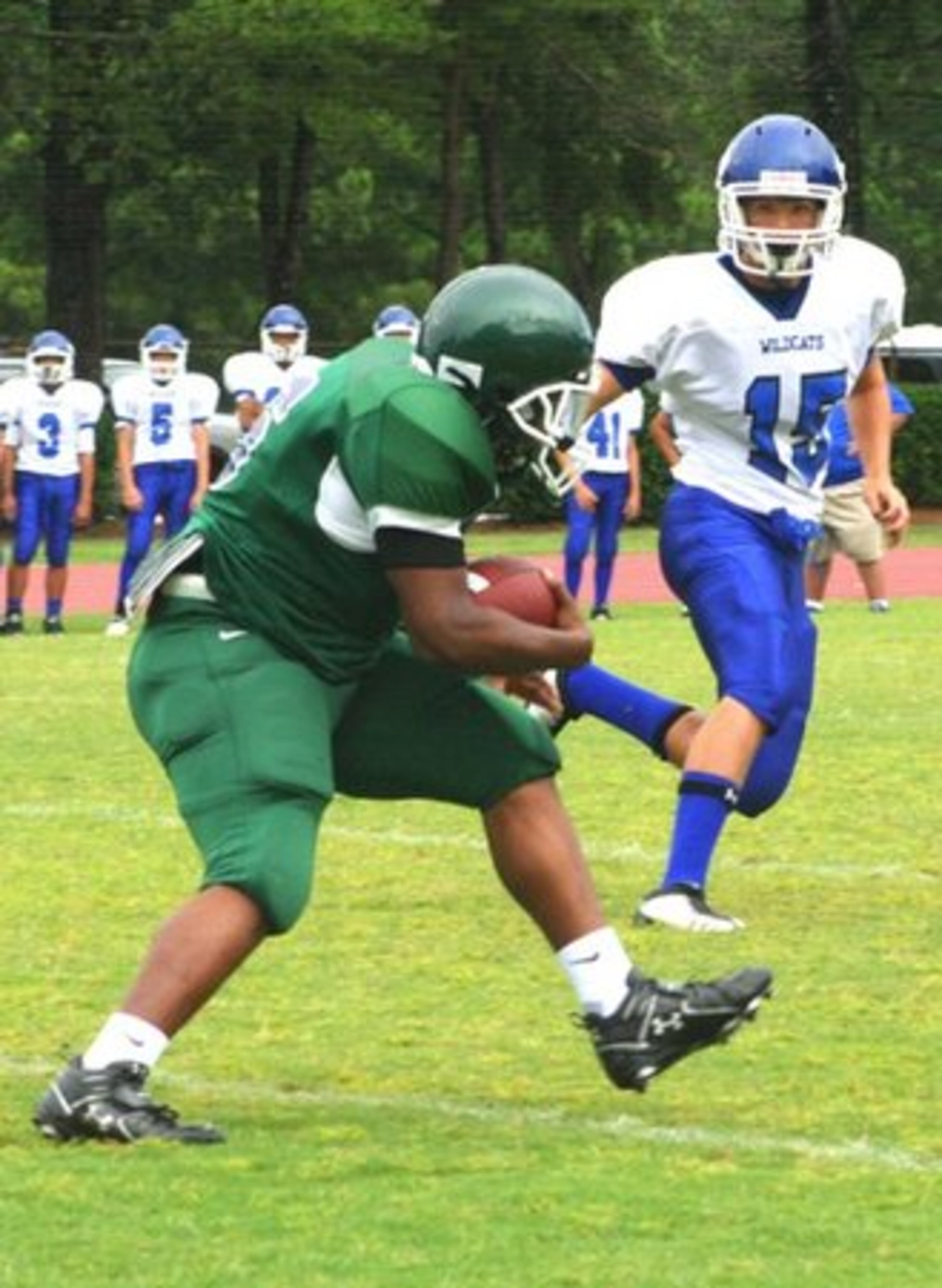 DeKalb County's Arabia Mountain (in green, vs. new Henry Co. school Locust Grove) is 1-3, its lone win coming against fellow first-year school Walnut Grove (1-3).