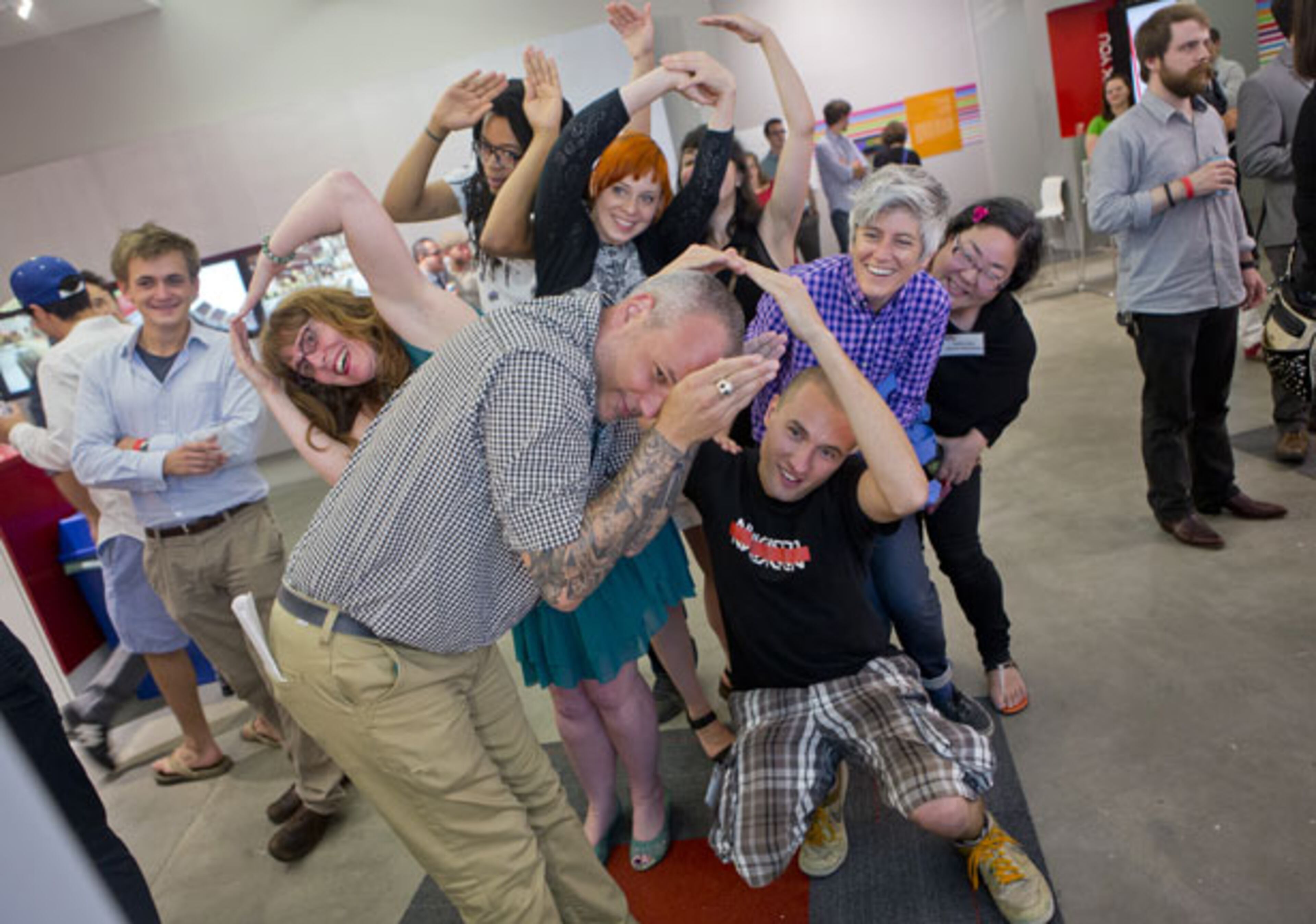 Exhibition curators and artists play Ninja Shadow Warrior at the Museum of Design Atlanta, which is hosting the exhibit “XYZ: Alternate Voices in Game Design” through Sept. 2, 2013. In this interaction and cooperation-encouraging game, players use ninja magic to hide within the silhouette of objects in a castle. By using their bodies to mimic the shape of objects, players are able to avoid detection.