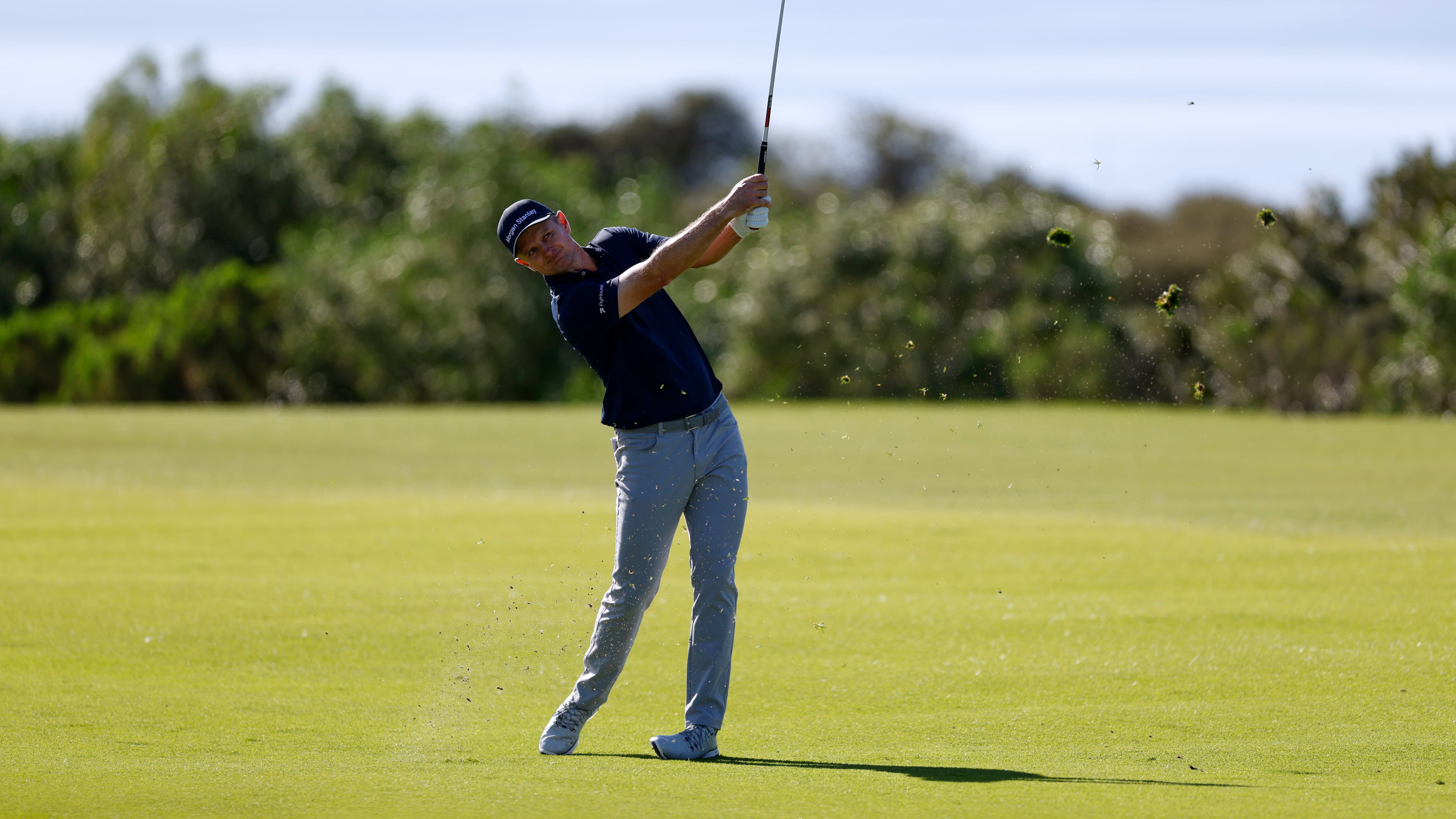 Justin Rose, of England, hits from the 17th fairway while playing the South Course at Torrey Pines during the second round of the Farmers Insurance Open golf tournament Friday, Jan. 30, 2026, in San Diego. (AP Photo/Caroline Brehman)