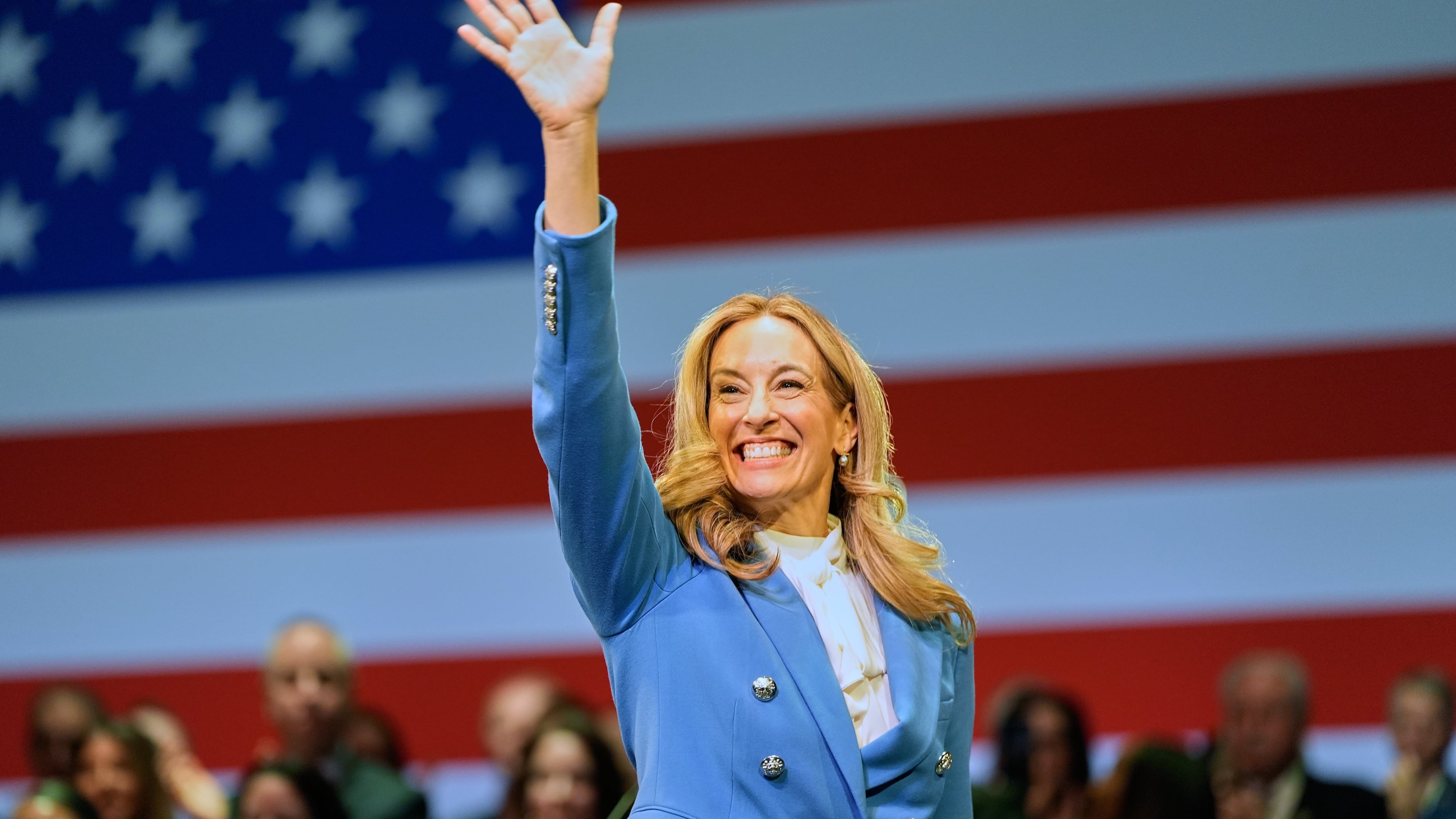 FILE - New Jersey Gov. Mikie Sherrill waves during her inauguration ceremony in Newark, N.J., Tuesday, Jan. 20, 2026. (AP Photo/Seth Wenig, File)