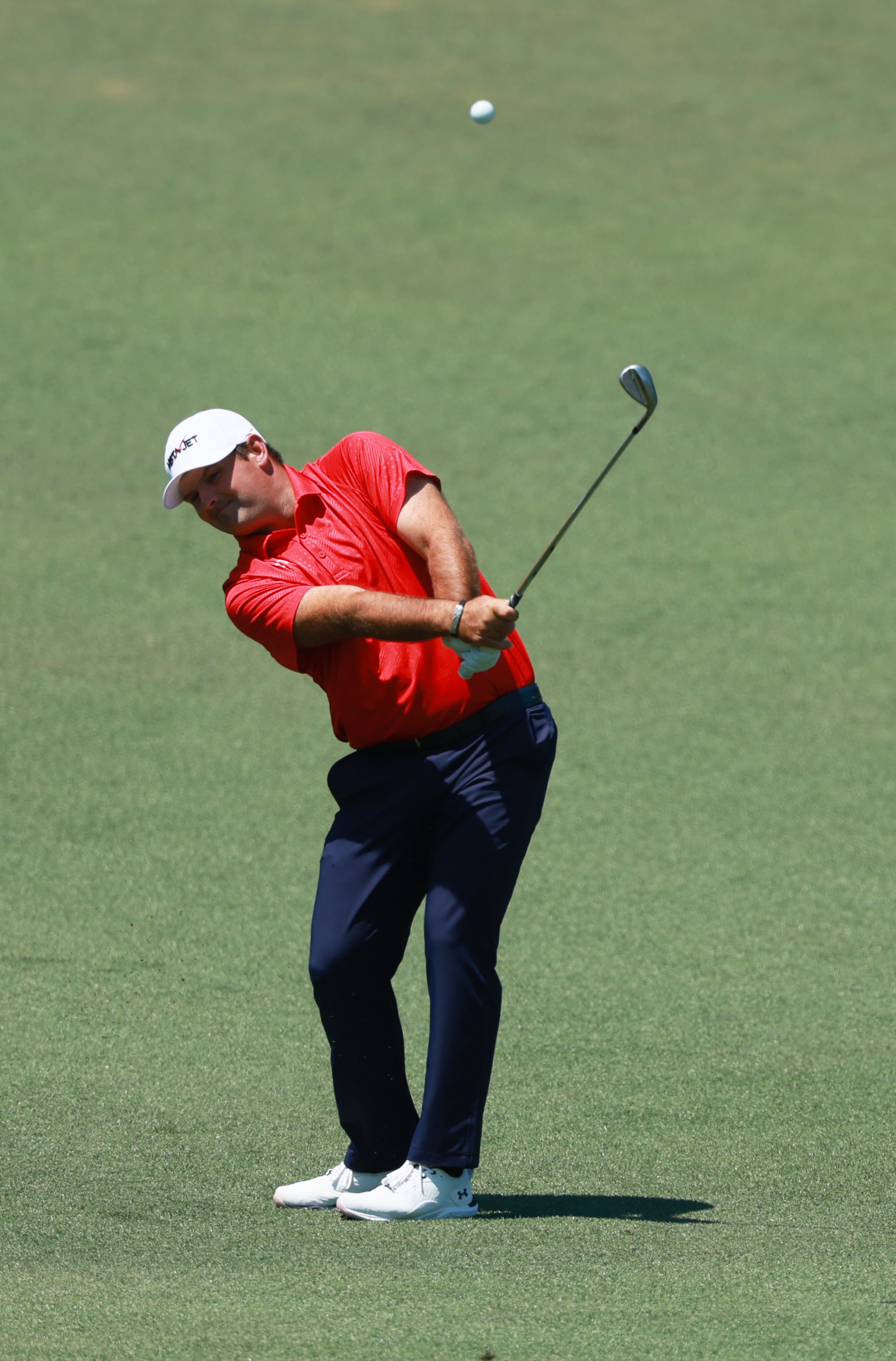 Patrick Reed chips to second green during final round of the Masters, at Augusta National Golf Club, Sunday, April 12, 2026, in Augusta, GA (Jason Getz/AJC)