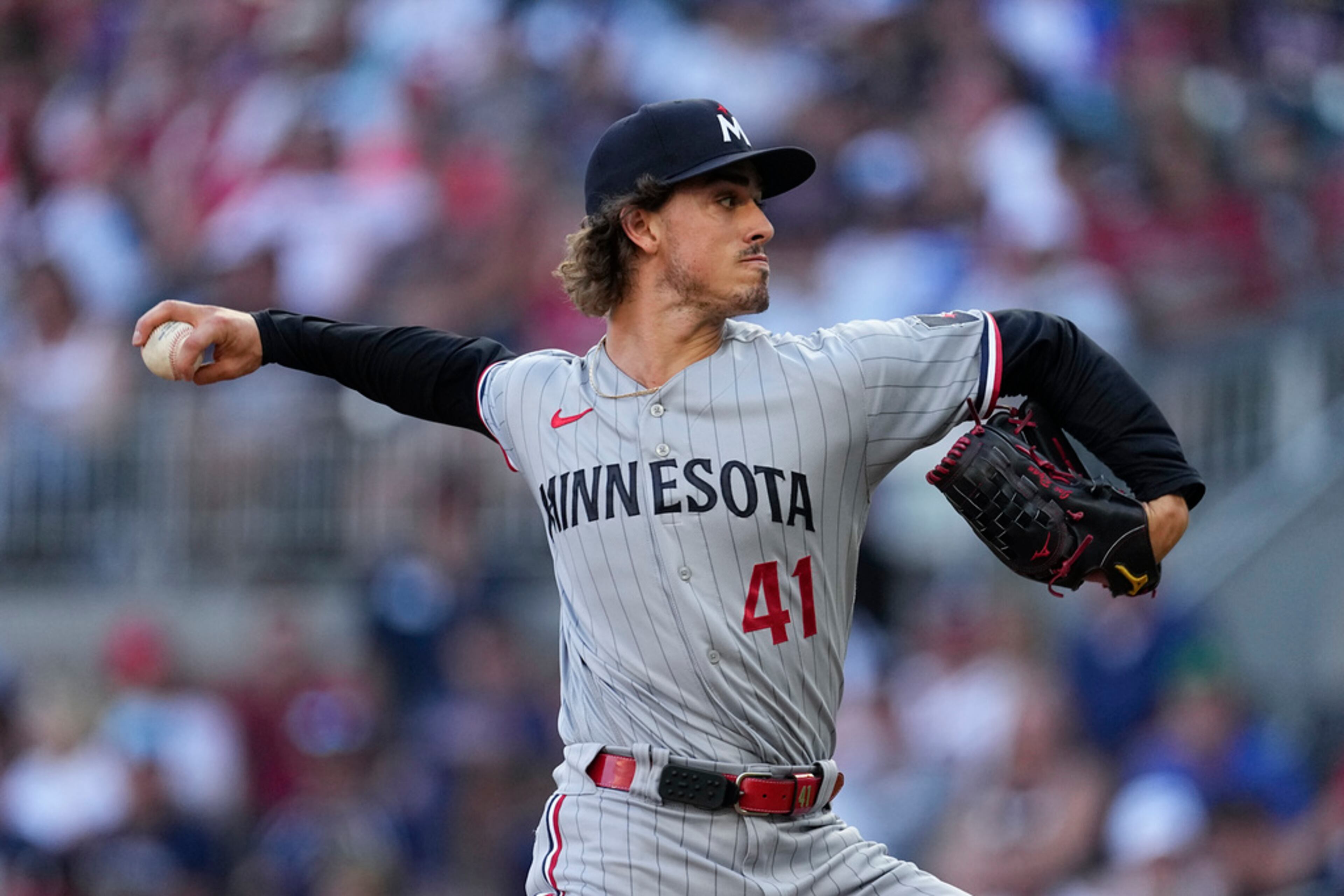 Minnesota Twins starting pitcher Joe Ryan works against the Atlanta Braves during the first inning of a baseball game Tuesday, June 27, 2023, in Atlanta. (AP Photo/John Bazemore)