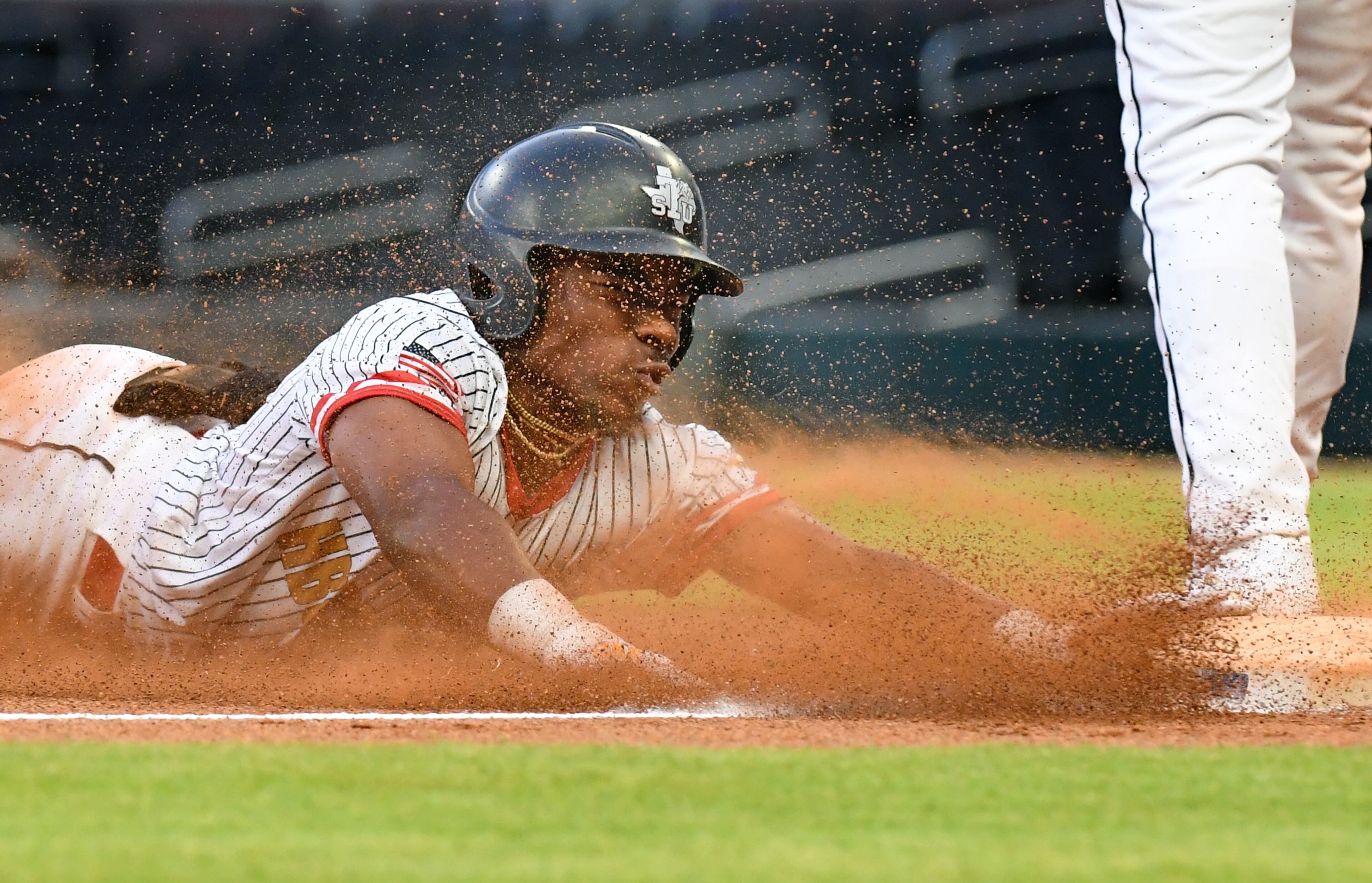 June 3, 2022 Atlanta - HBCU All-Star White team's infielder Ty Hill (1) hits a triple in the 3rd inning of the Minority Baseball Prospects HBCU All-Star Game at Truist Park on Friday, June 3, 2022. (Hyosub Shin / Hyosub.Shin@ajc.com)
