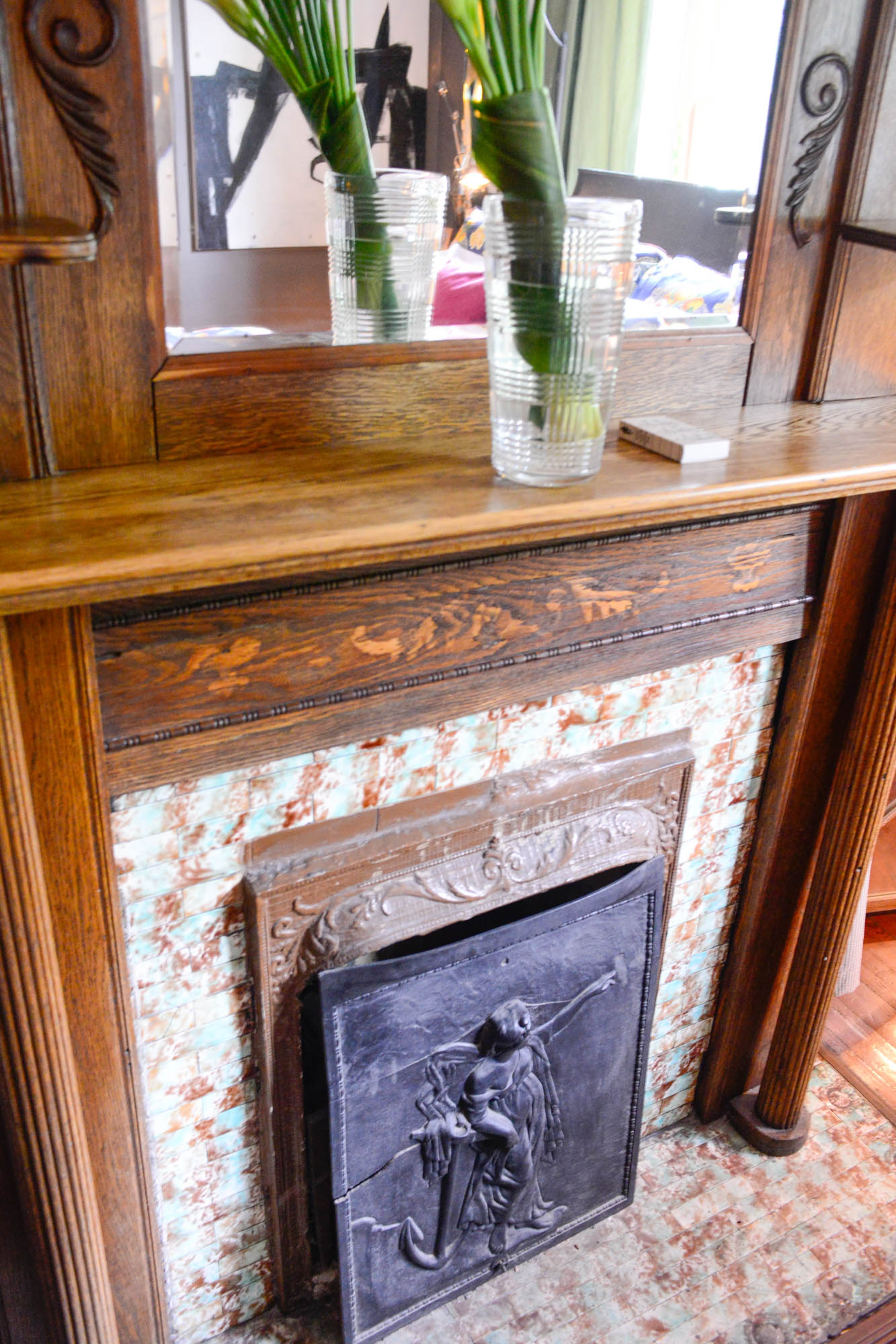 The four fireplaces in Brad Resler's and David Pippin's century-old folk Victorian home are original.